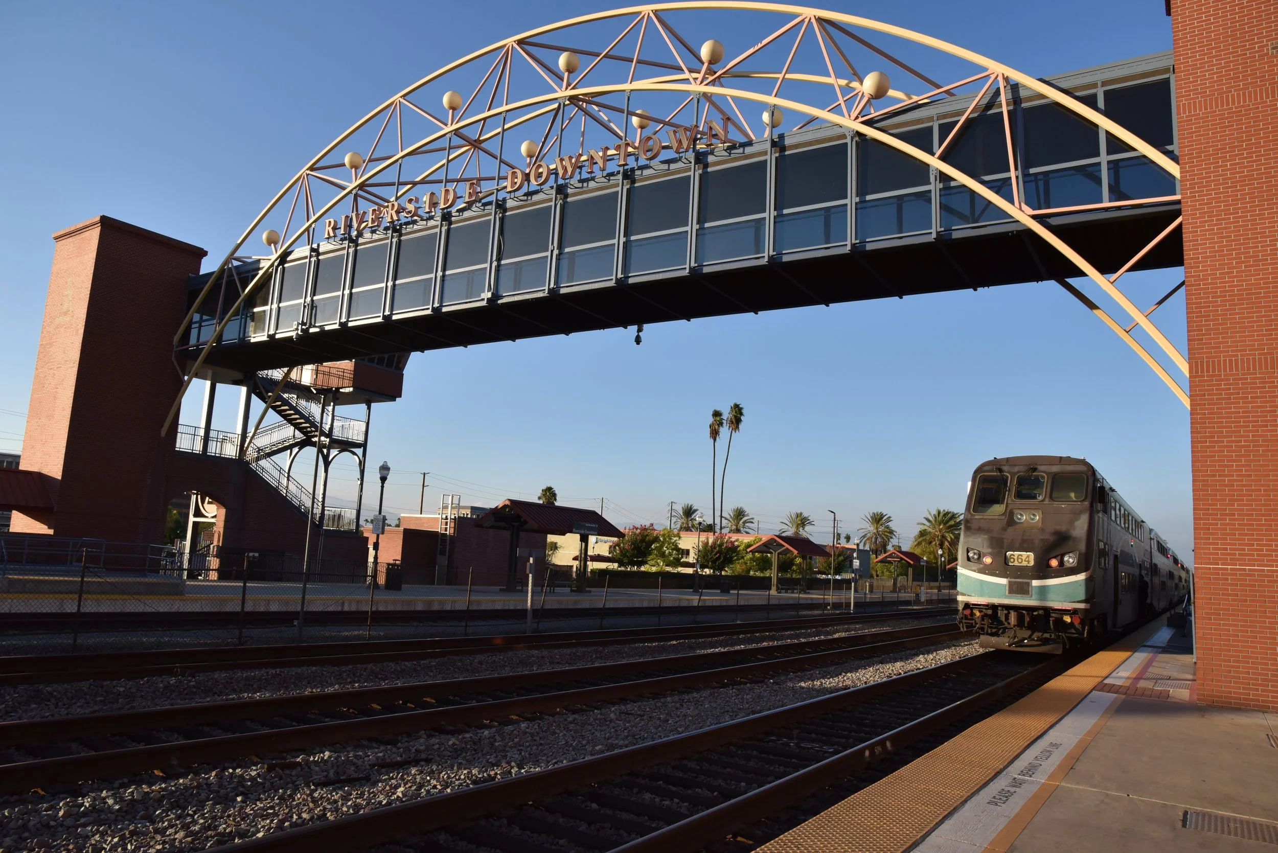 Riverside-Downtown Station Amtrak metrolink transport hub bridge with resting train