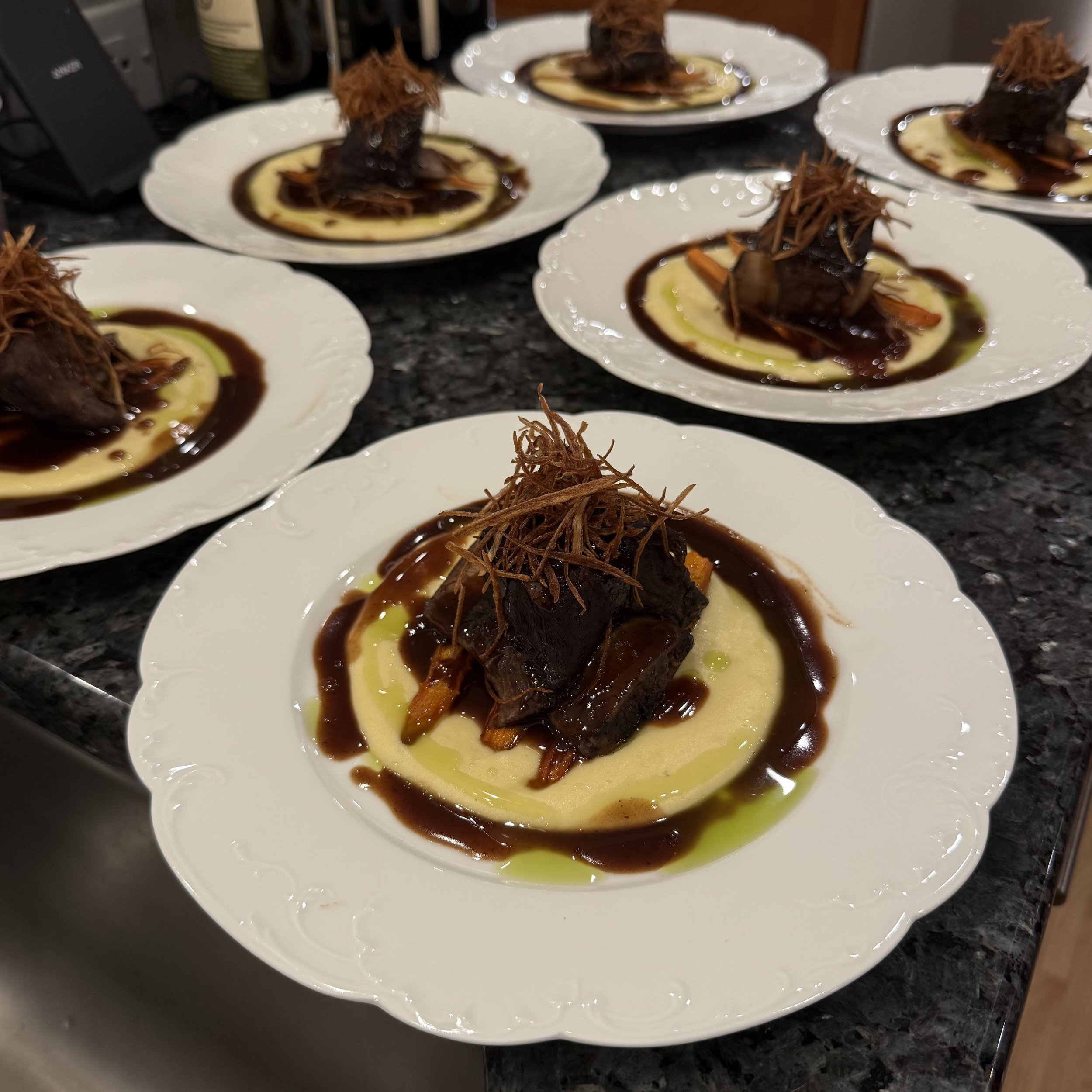 PINOT BRAISED SHORT RIB, PARSNIP PURÉE, DEMI-GLACE, CRISPY SHALLOTS, HERB OIL
