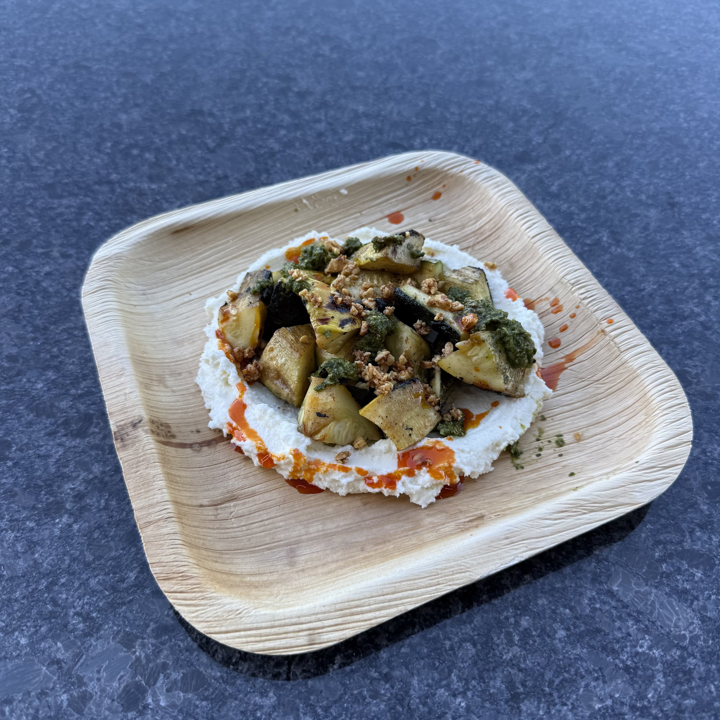 LABNEH, WOOD-FIRED SQUASH, TOASTED ALMONDS, SALSA VERDE, SMOKED PAPRIKA OIL