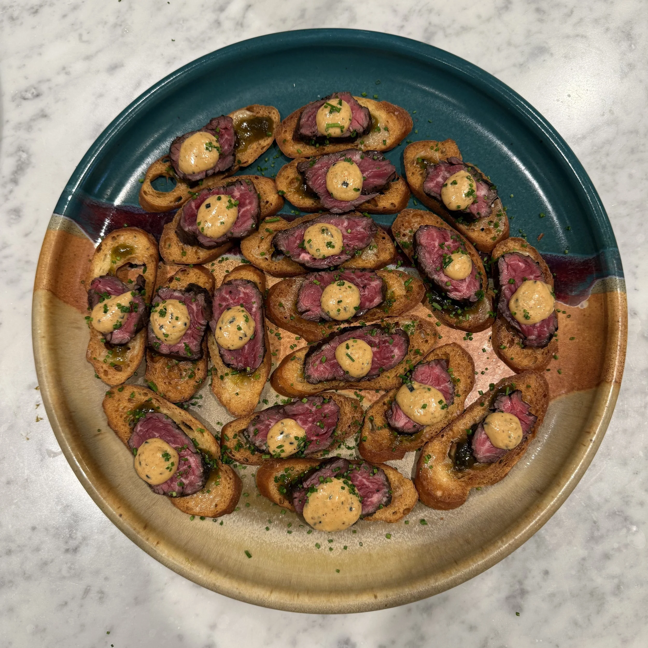 BEEF CARPACCIO CROSTINIS