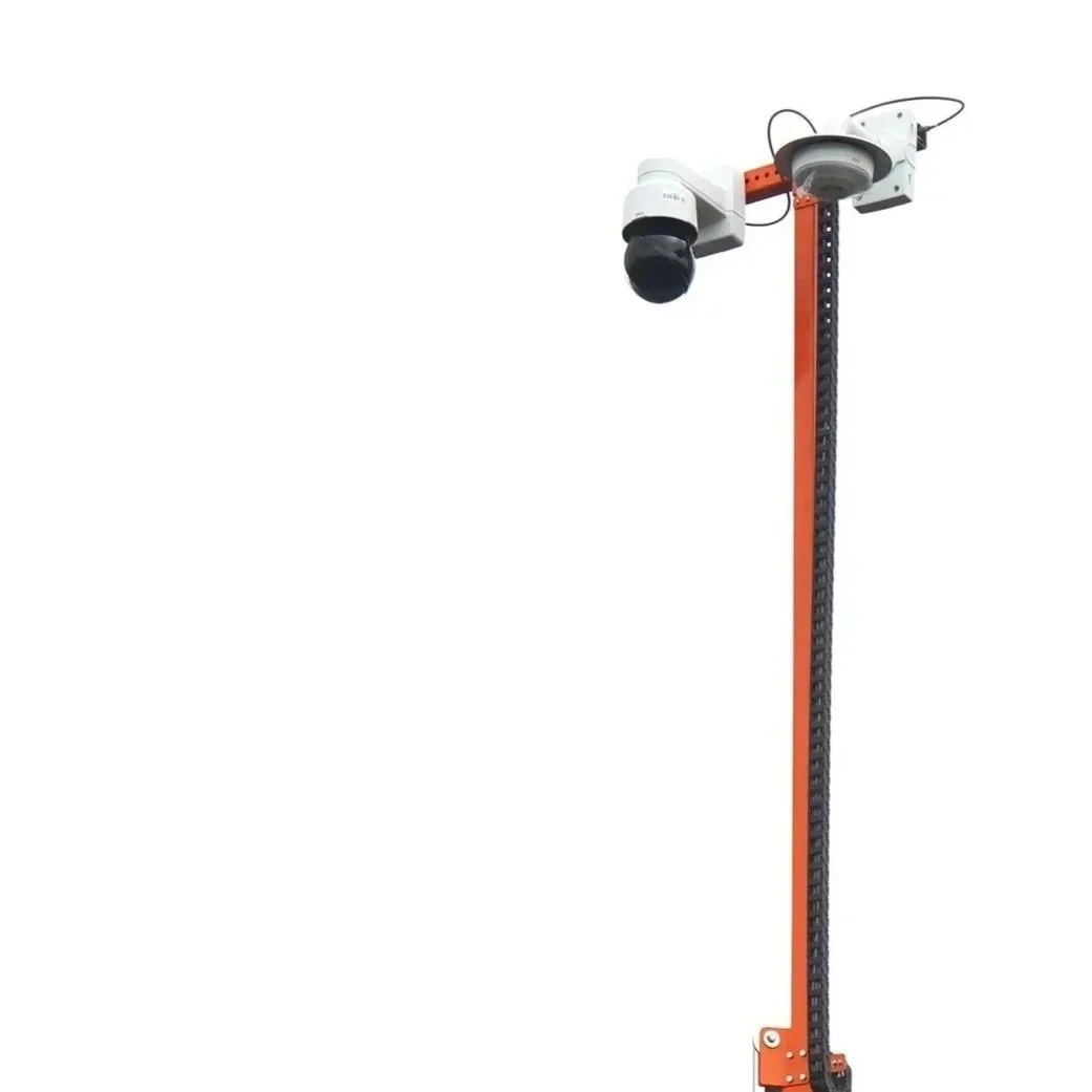 A tall orange and black pole with a surveillance camera and other equipment mounted at the top.