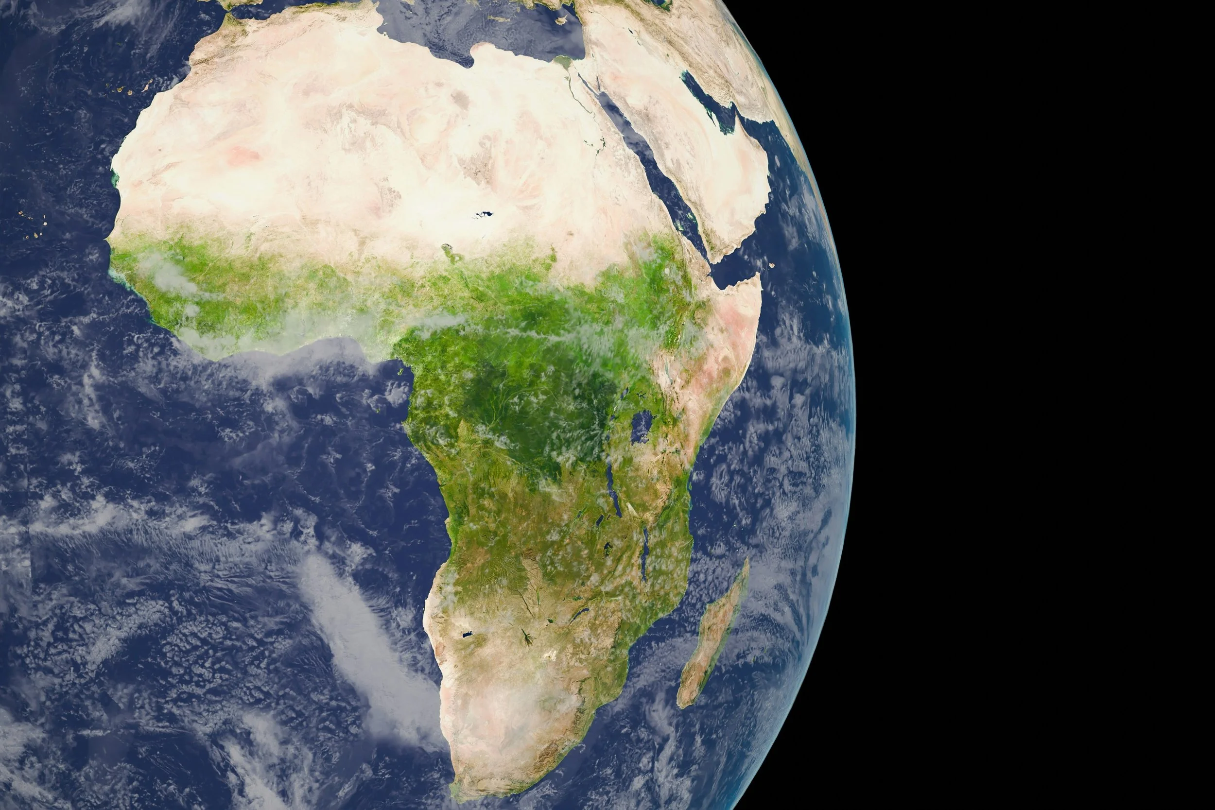 Satellite view of the Earth focusing on Africa, the Middle East, and parts of Europe and Asia, with visible landmasses, bodies of water, and cloud formations.