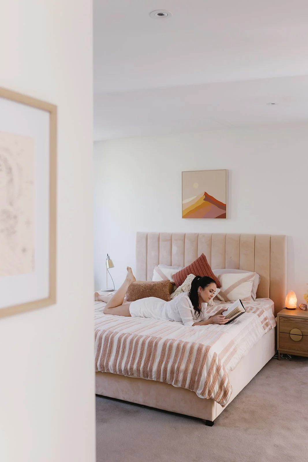 Woman relaxing and reading to calm anxiety
