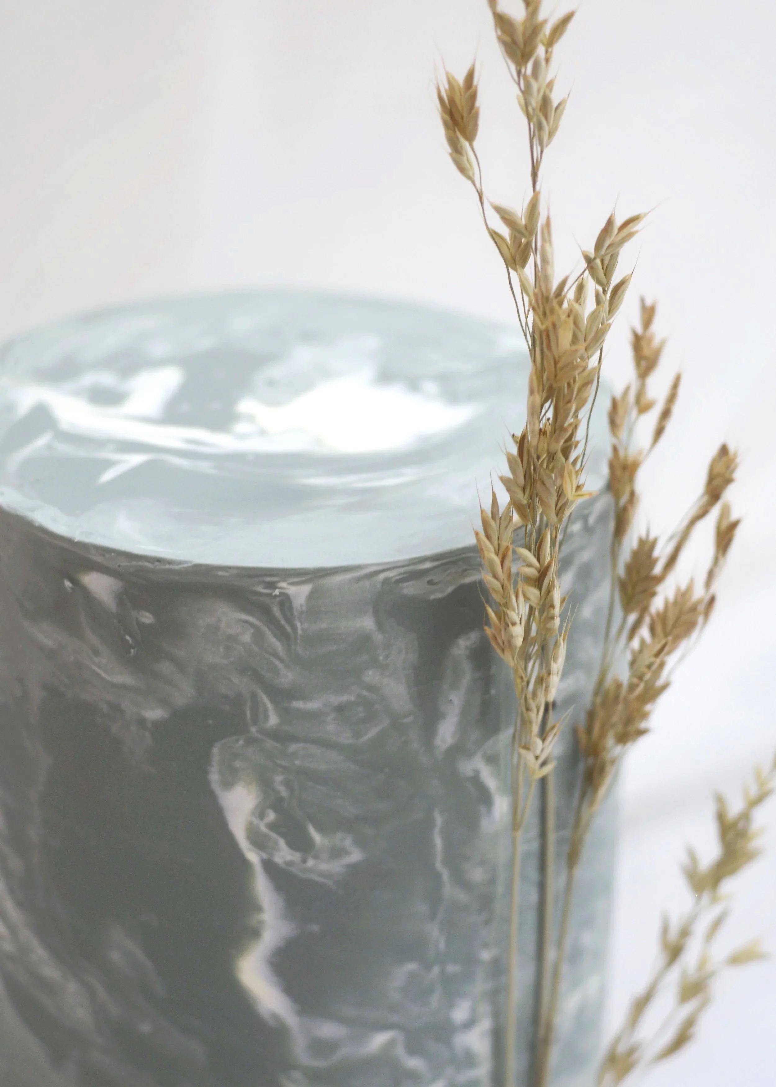 Close-up of textured ganache marble pattern celebration cake, architect-designed, Manchester
