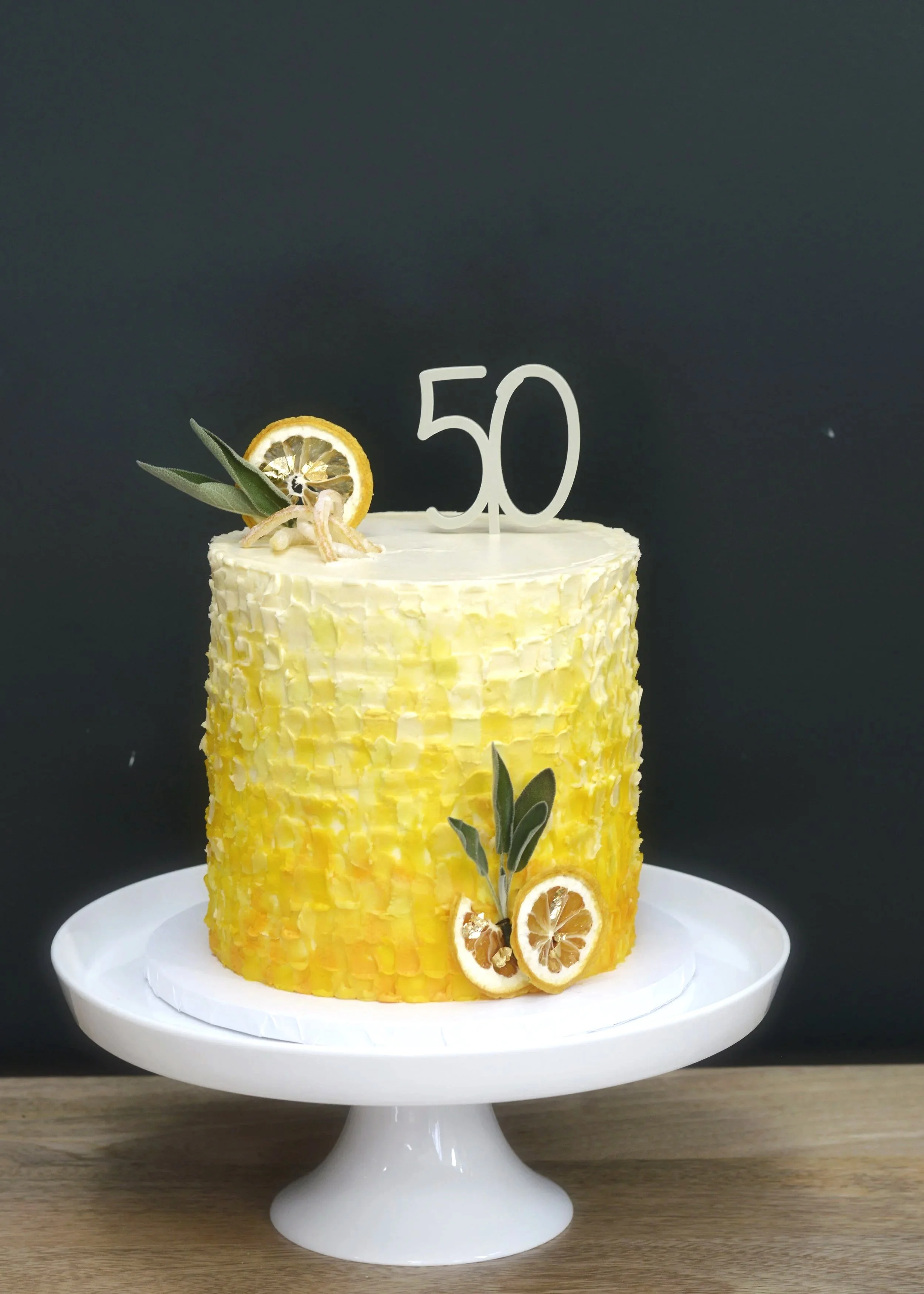 Full view of bespoke celebration cake, architect-designed, art inspired, mosaic, lemon cake, handmade in Manchester