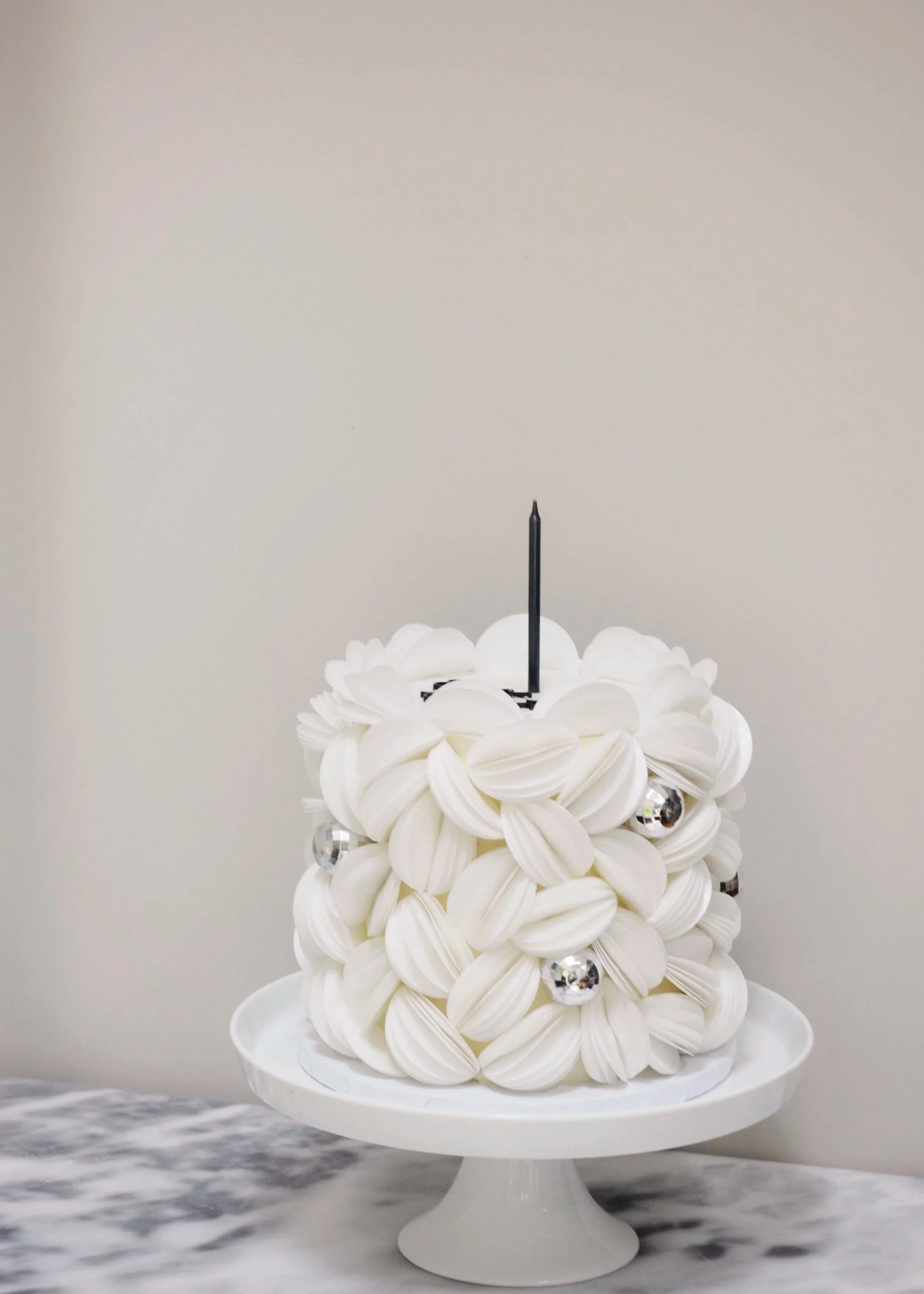 Disco themed white cake 