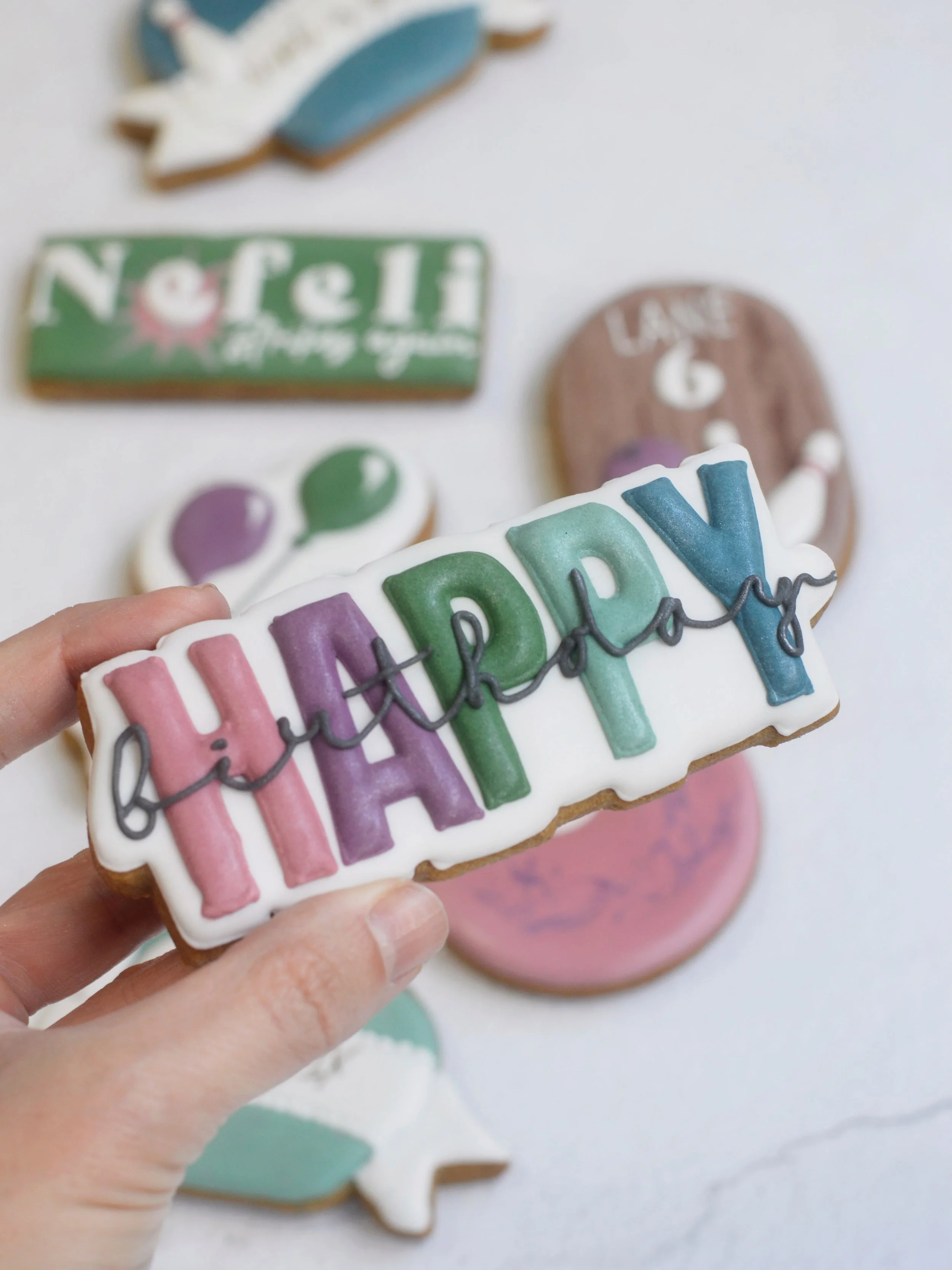 Bowling party 🎳 cookies for Nefeli&rsquo;s sixth birthday and yes it&rsquo;s a strike!! 
Lane 6 (obviously), party balloons, banner hearts and a big colourful HAPPY birthday plaque all for the party bags! 
Cookies that get photographed by parents an