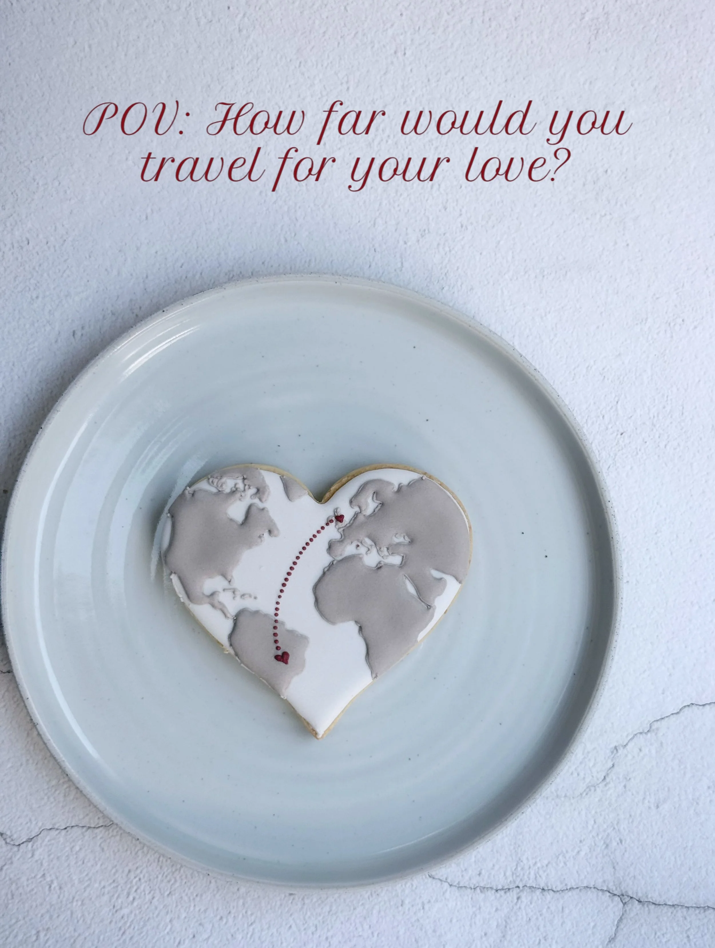 POV: How far would you travel for your love? &hearts;️
A heart shaped world map cookie with a tiny dotted flight path&hellip;one of my favourite cookies I&rsquo;ve ever made! 
I made this cookie as part of an anniversary set for a lovely couple whose