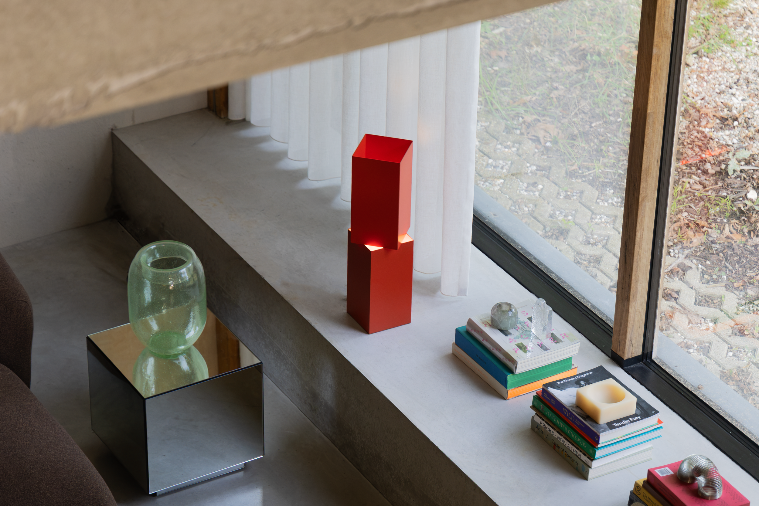 Stack Table Light designed by Simone Smelt for FEST Amsterdam exhibited during dutch design week 2026 at the exhibition forward furniture high end design scultural design piece collectible design minimalist red table light