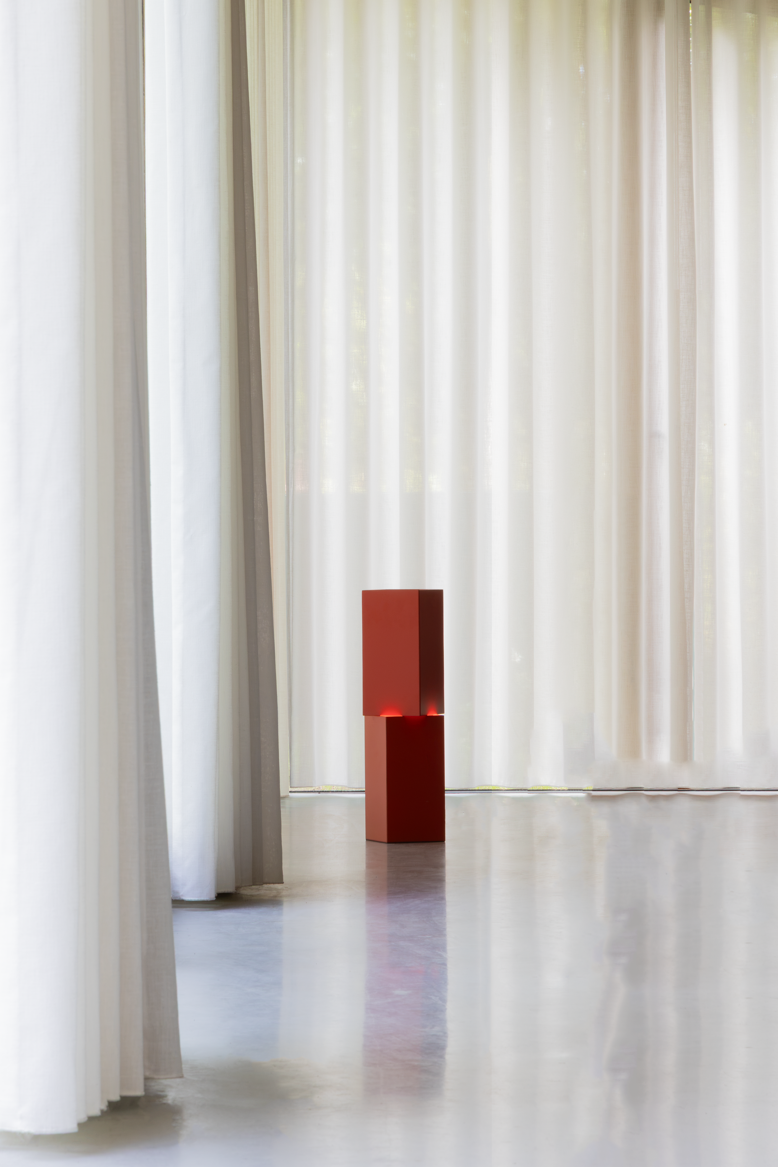 Stack Table Light designed by Simone Smelt for FEST Amsterdam exhibited during dutch design week 2026 at the exhibition forward furniture high end design scultural design piece collectible design minimalist red table light