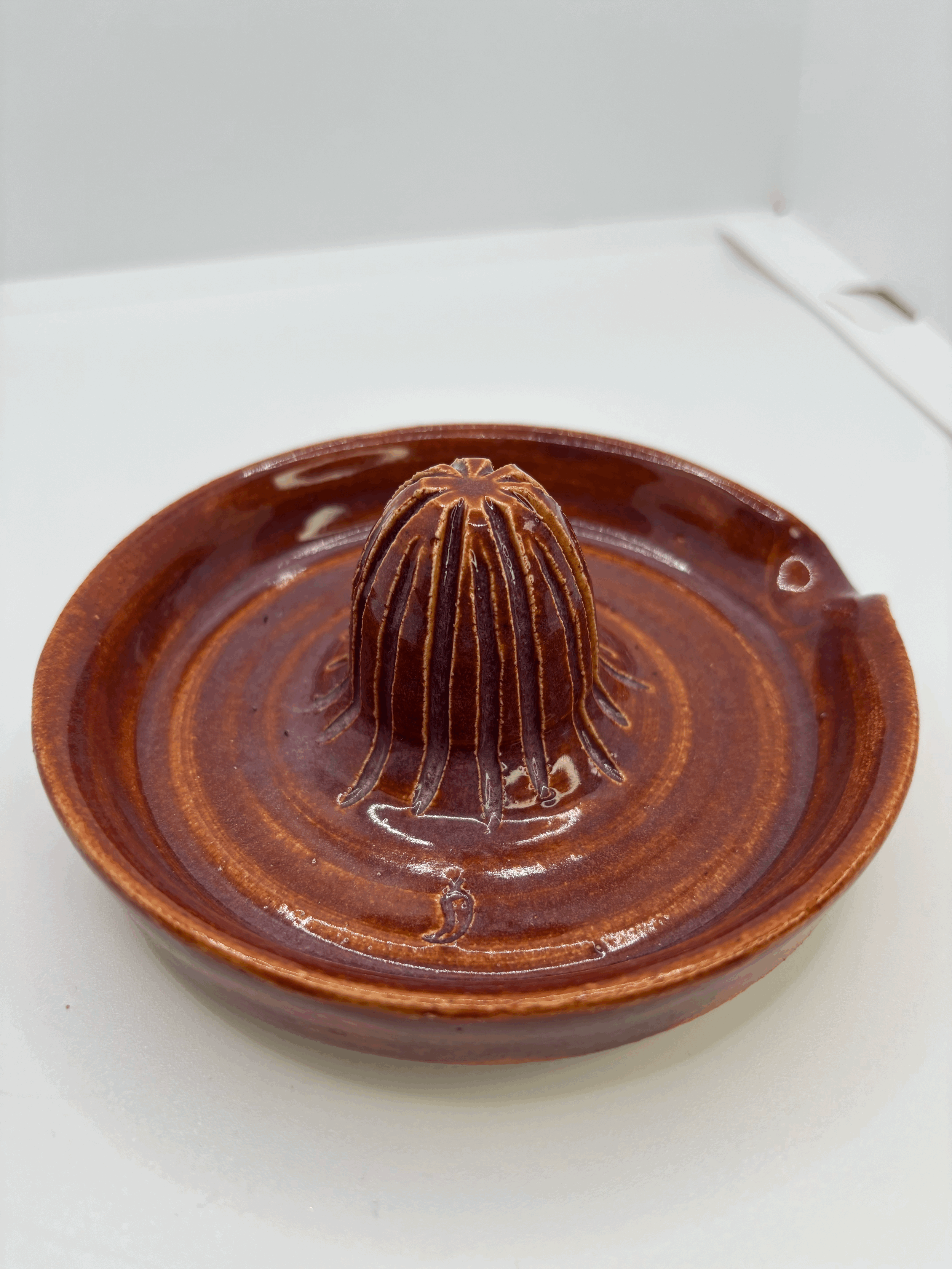 Hand thrown citrus juicer