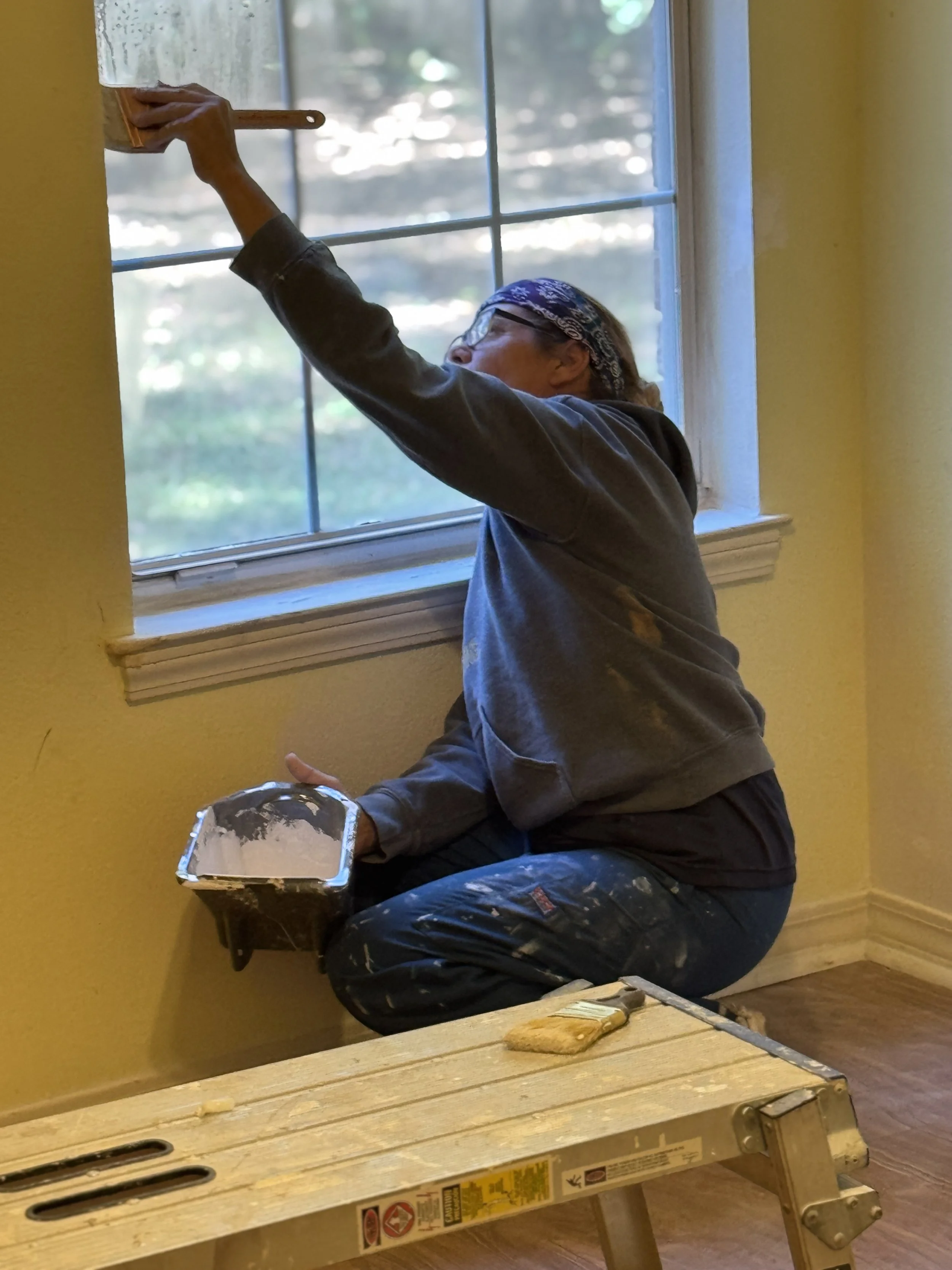 Painting a home in Escambia County, Florida done by Priority 1 Home Services