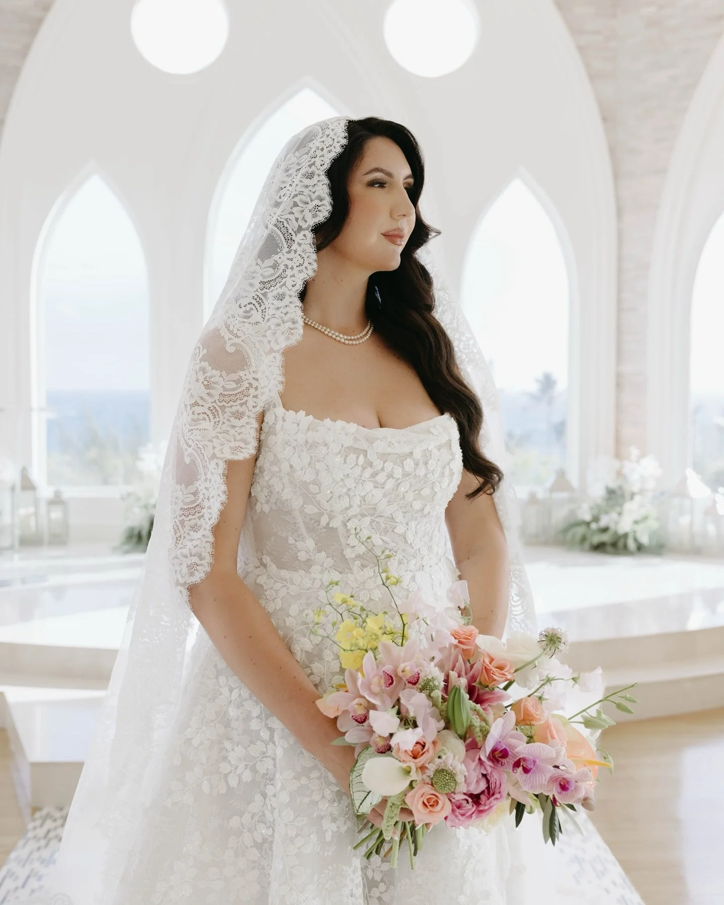 Day 1: Embracing the morning light for a serene Hawai&rsquo;i ceremony surrounded by breathtaking views. 

Congrats to Karleen &amp; Devake and thank you for bringing me along on your beautiful adventure! 🌊🐚 🌺

Venue: @kailanachapel 
Planner: @lay