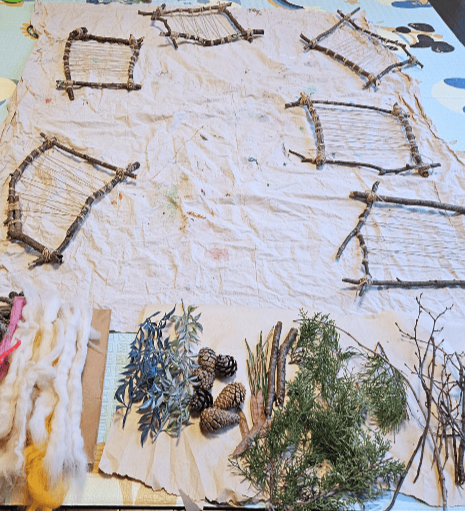 Weaving with Nature art class- variety of natural materials and loom made of wood