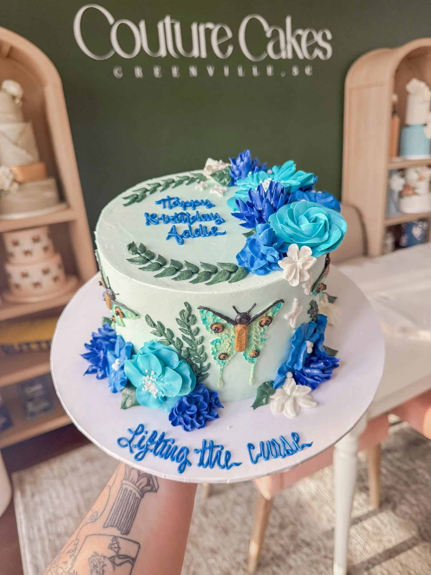 Our favorite cake this week! Shoutout to our talented decorator Amberlyn ! She hand piped all of that!! 🤯🩵🦋