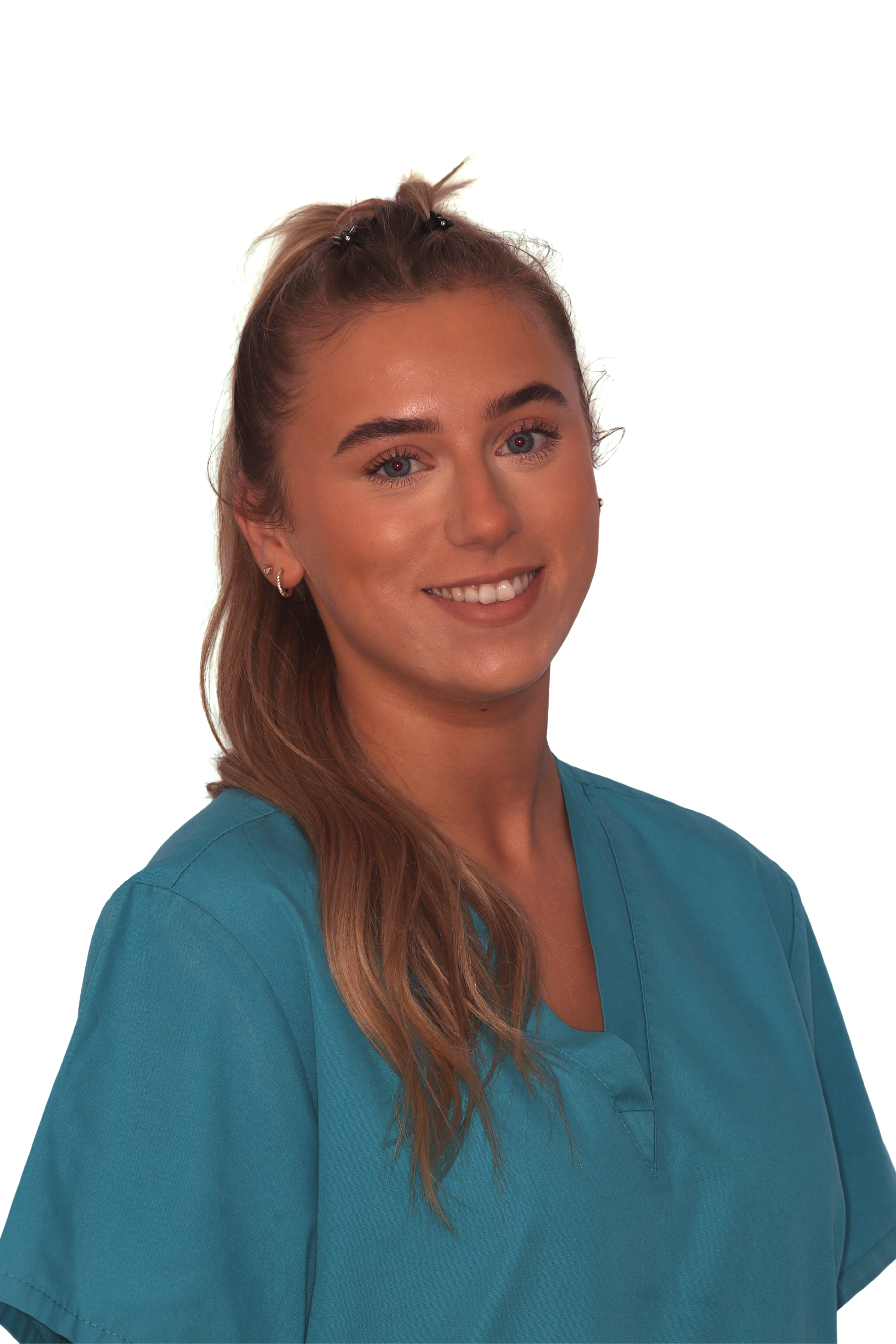 Smiling young woman with long blond hair in a blue shirt against a plain background.