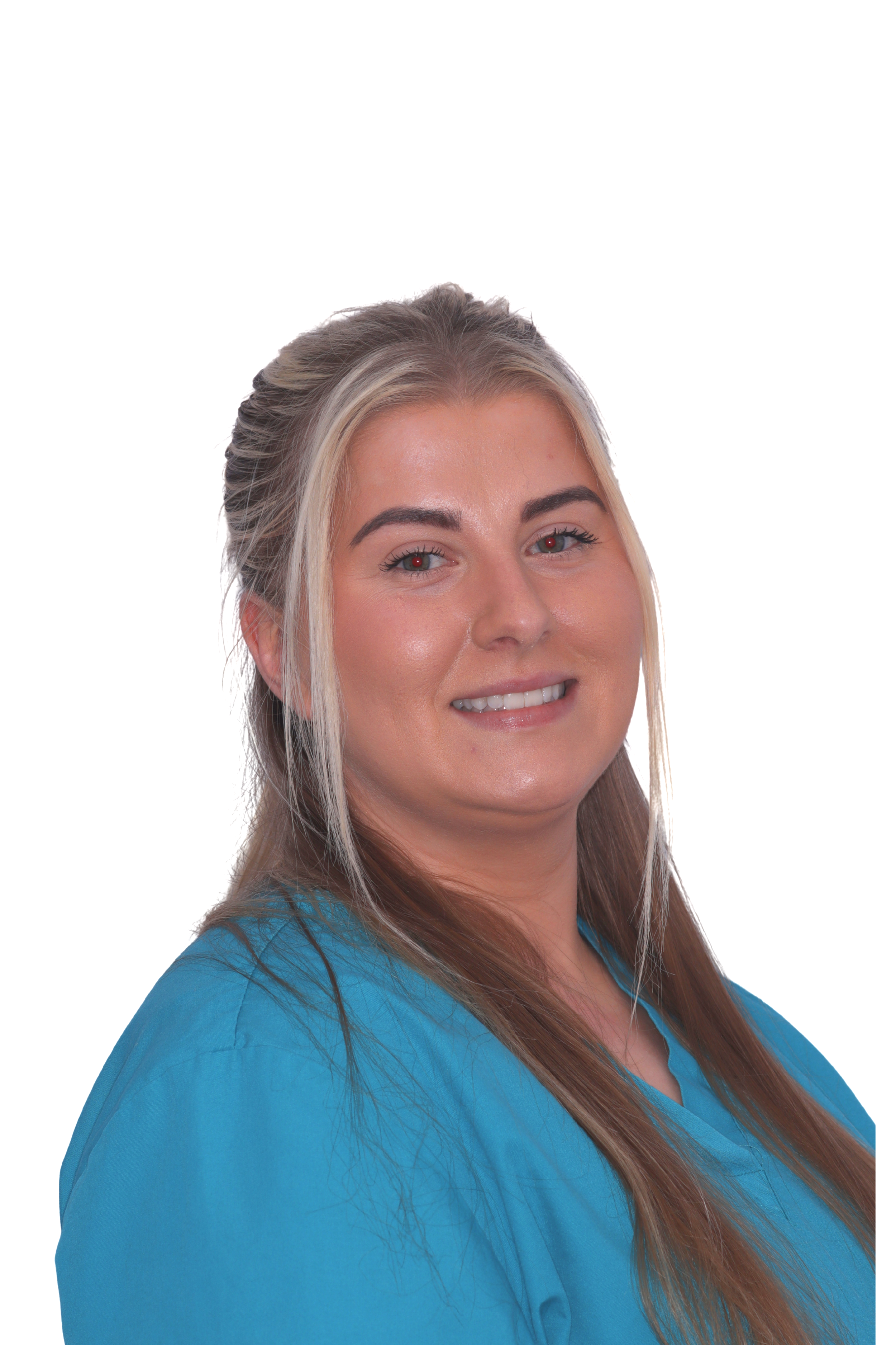 Person with glasses wearing teal scrubs