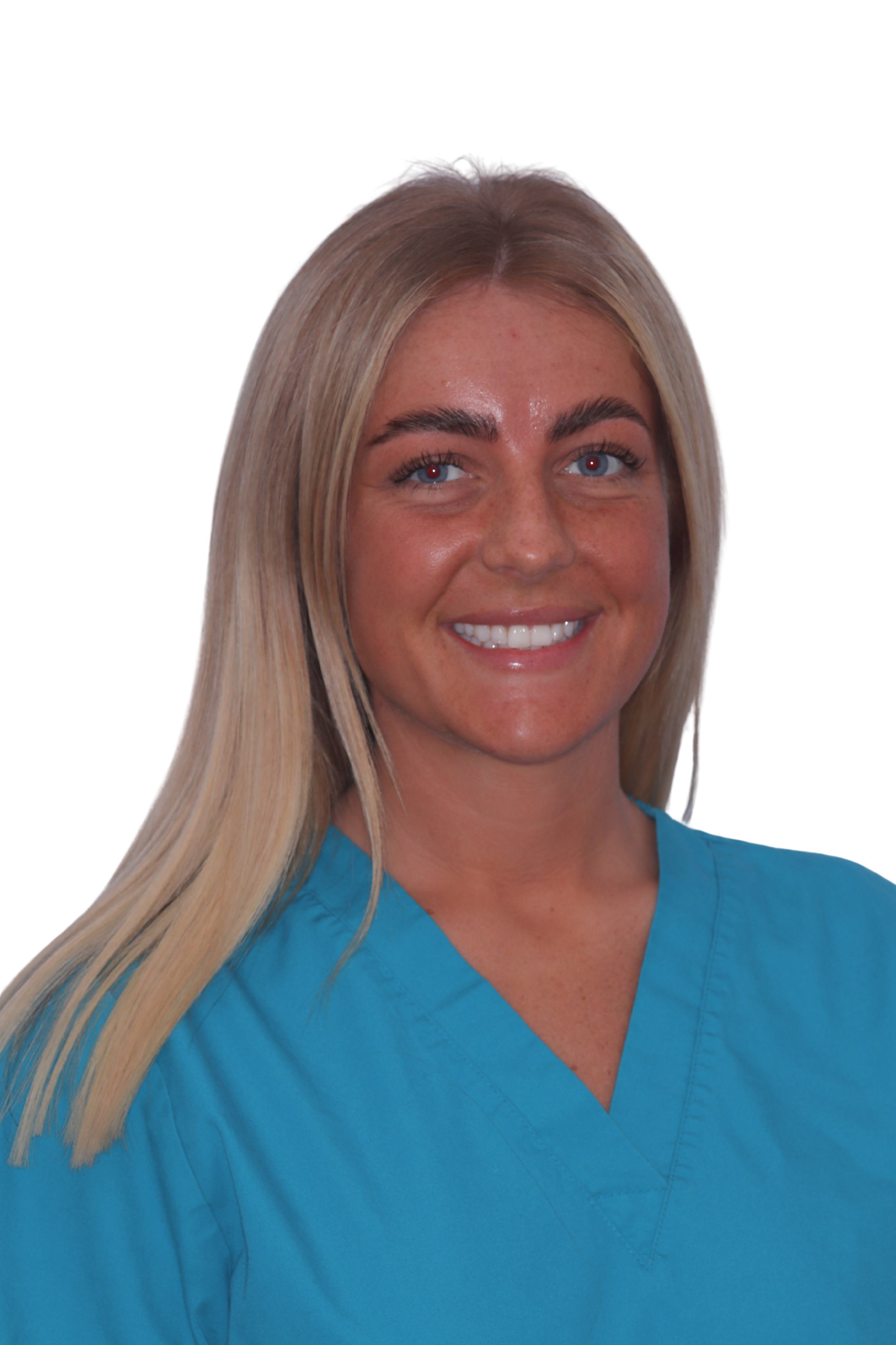 A woman wearing teal medical scrubs, smiling at the camera against a plain background.