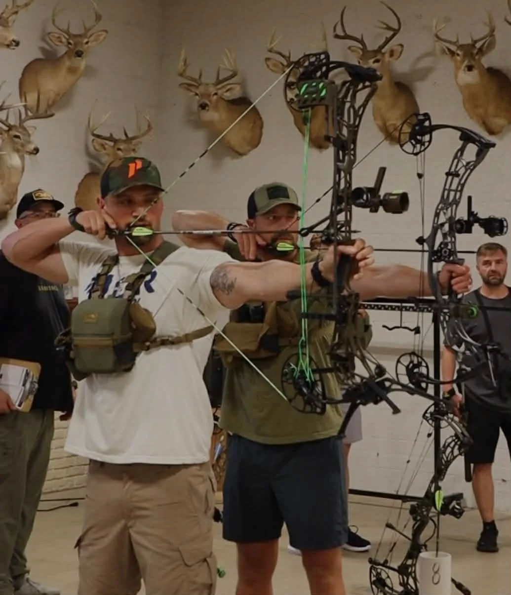 Kip and AJ shooting side by side on the range