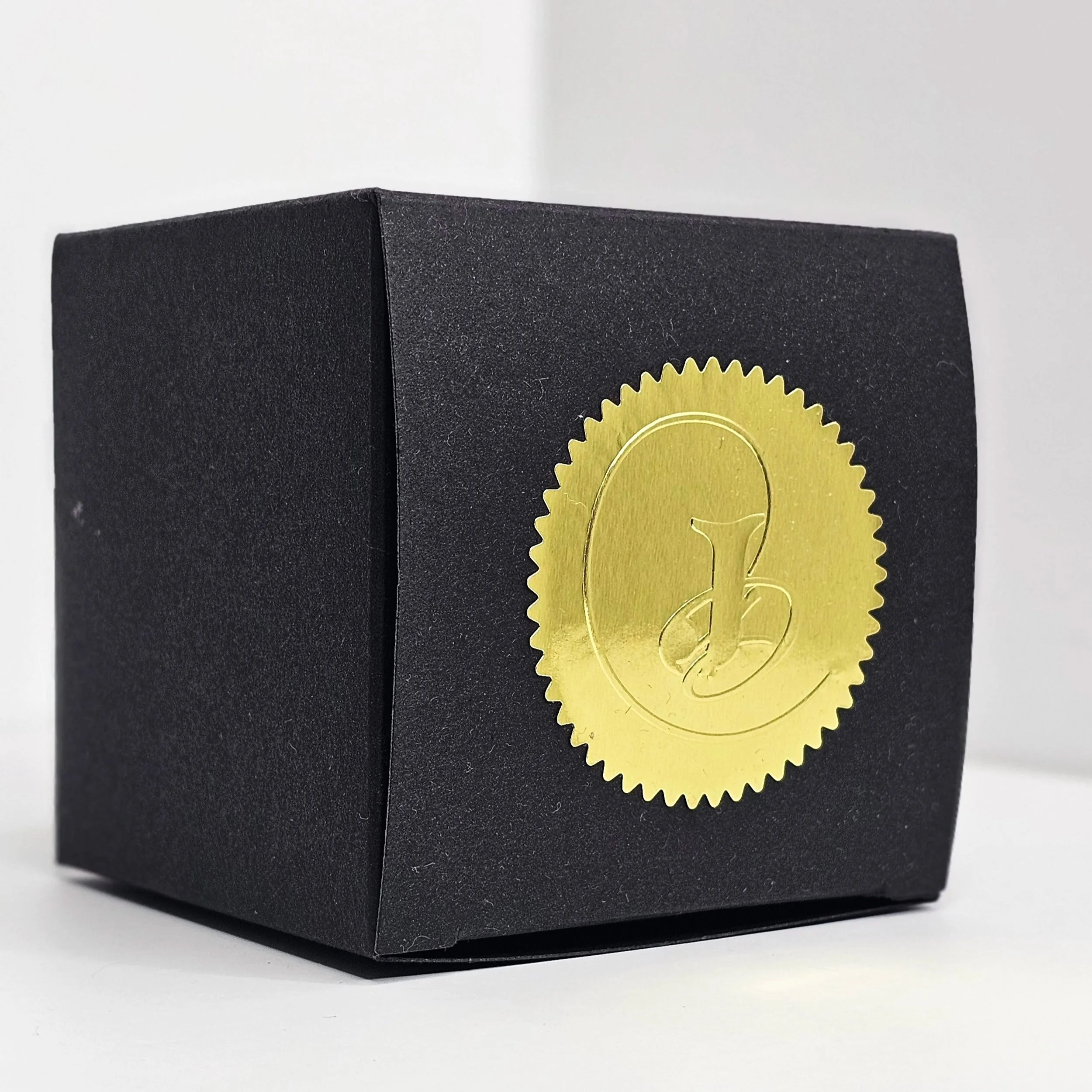 black+box+with+gold+sticker+side+view.jpg (Copy) (Copy)