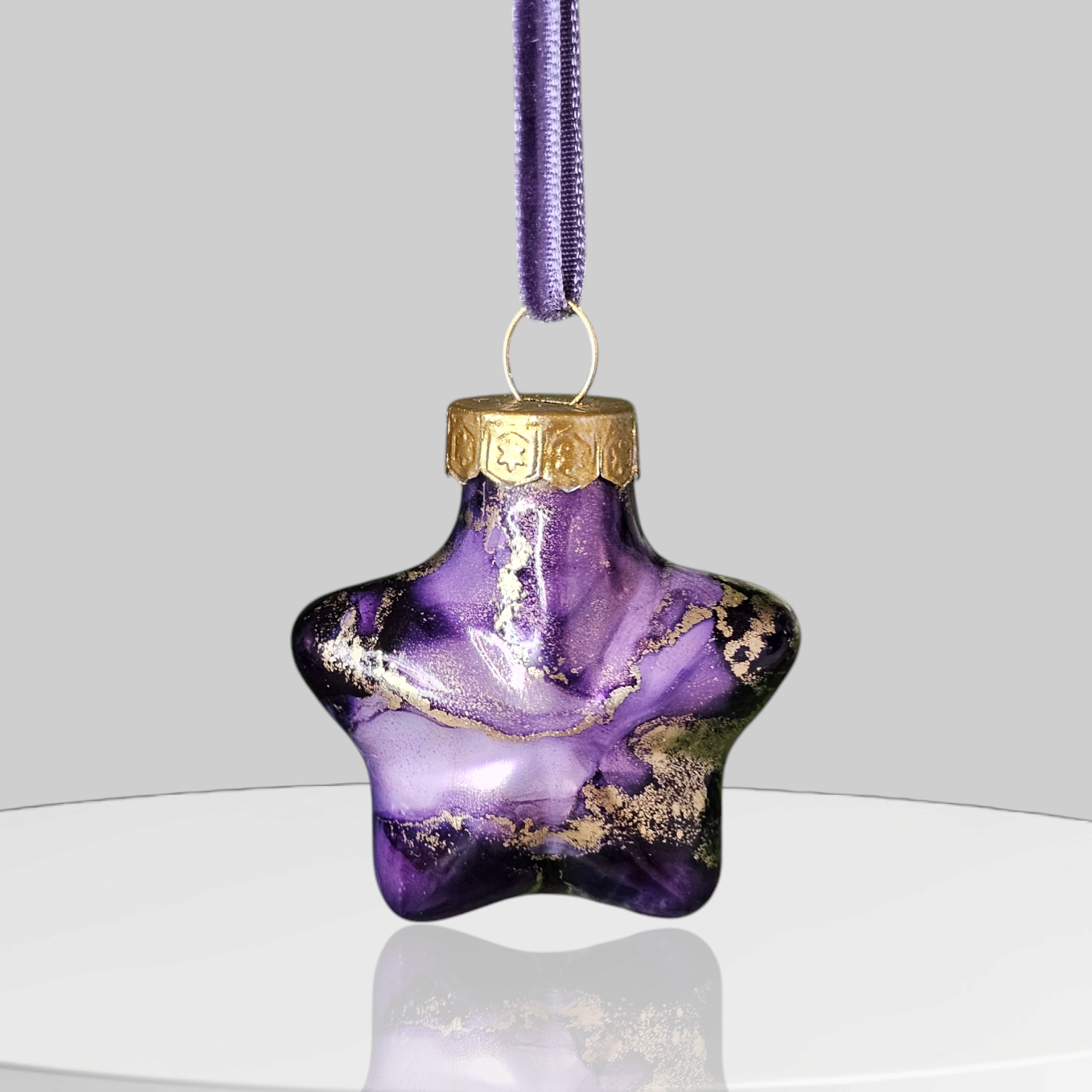 Mindnight Purple mini glass star baubles with dark velvet ribbon.png
