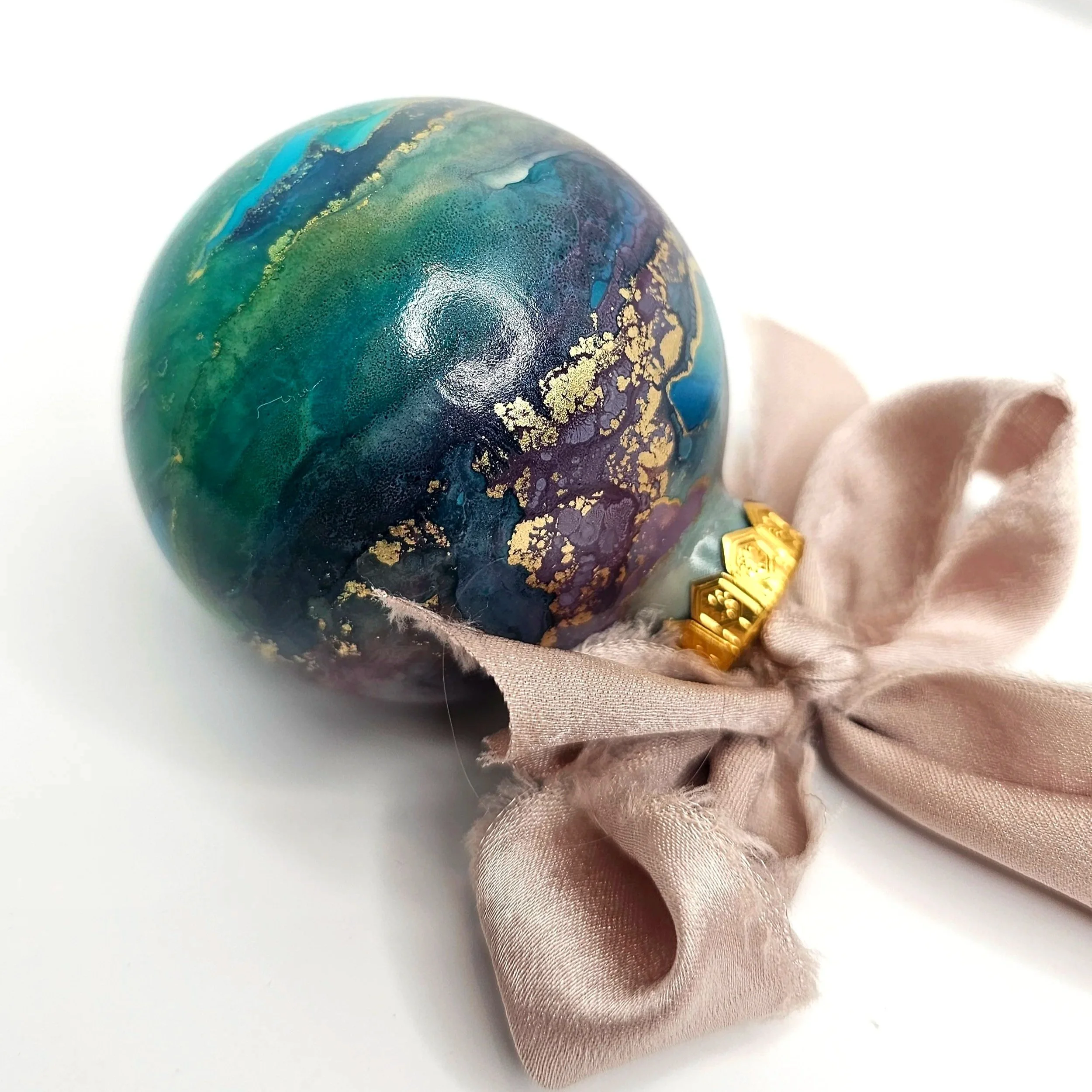 alcohol+ink+bauble+planet+design+with+pale+pink+ribbon.jpg