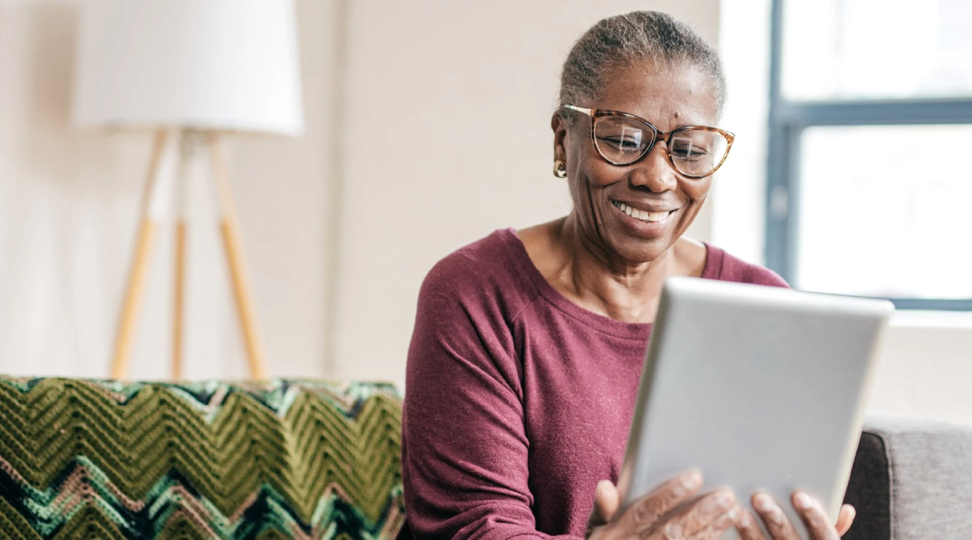 Optum VVS Digital_senior using tablet.jpg