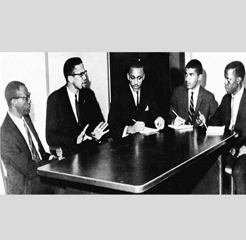 Malcolm X with Campus Digest Staff Feb 3 1963.jpg