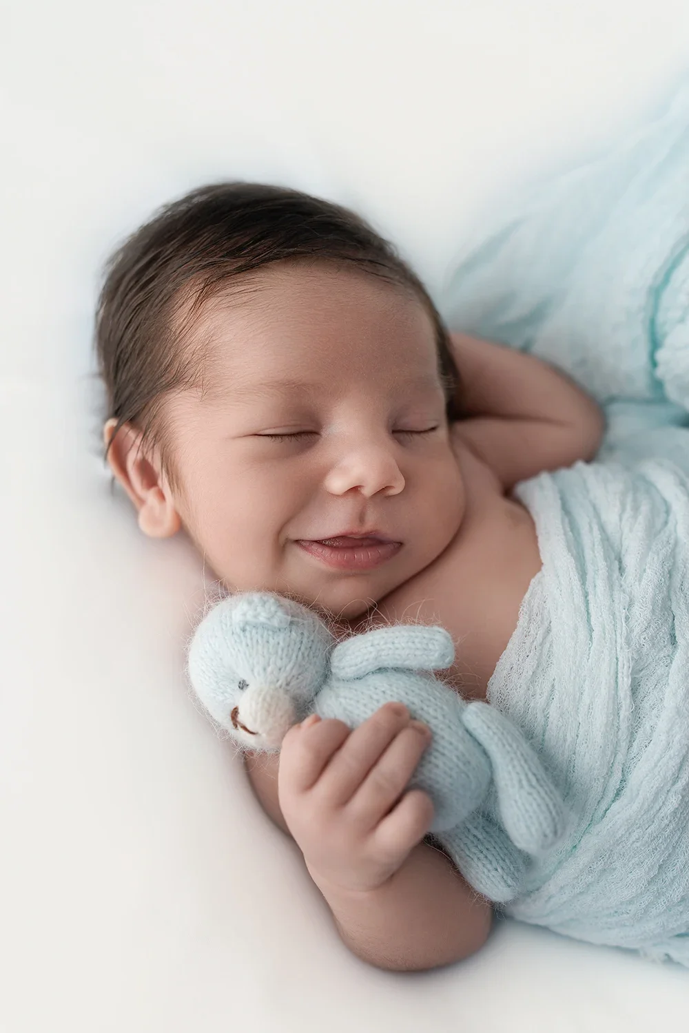 newborn-shooting-baby-blaue-wolle.webp