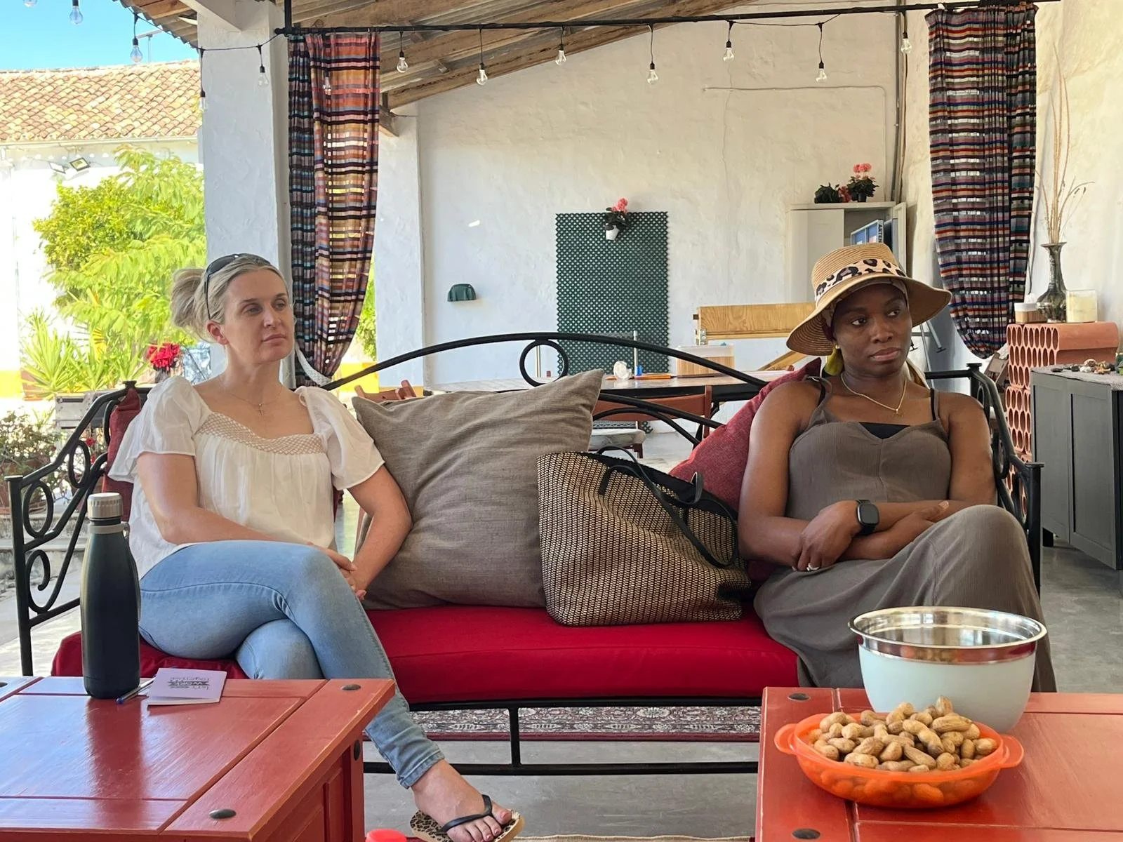 Stacked rock formations under a blue sky.