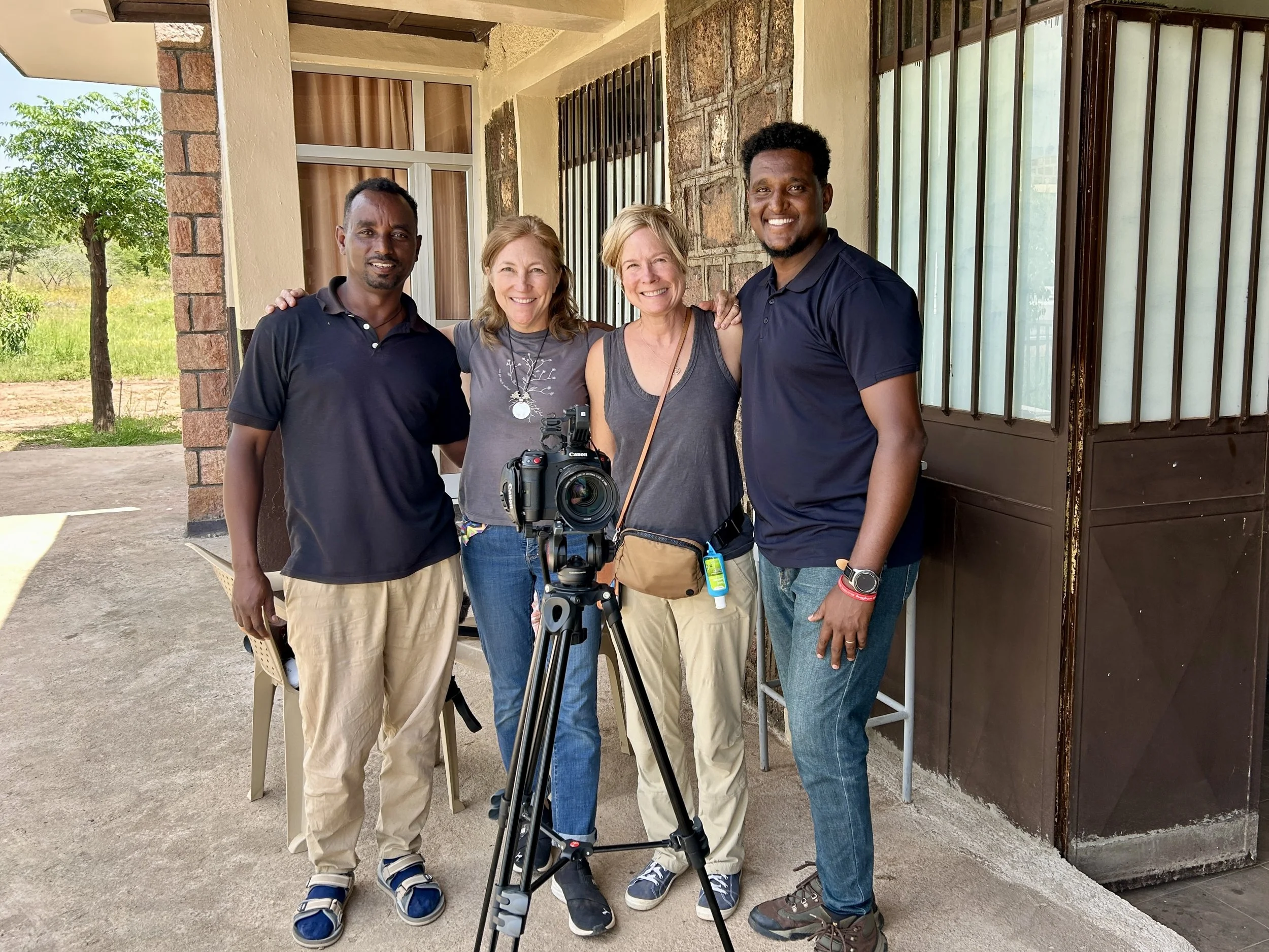 7 Mo posing with crew.jpeg