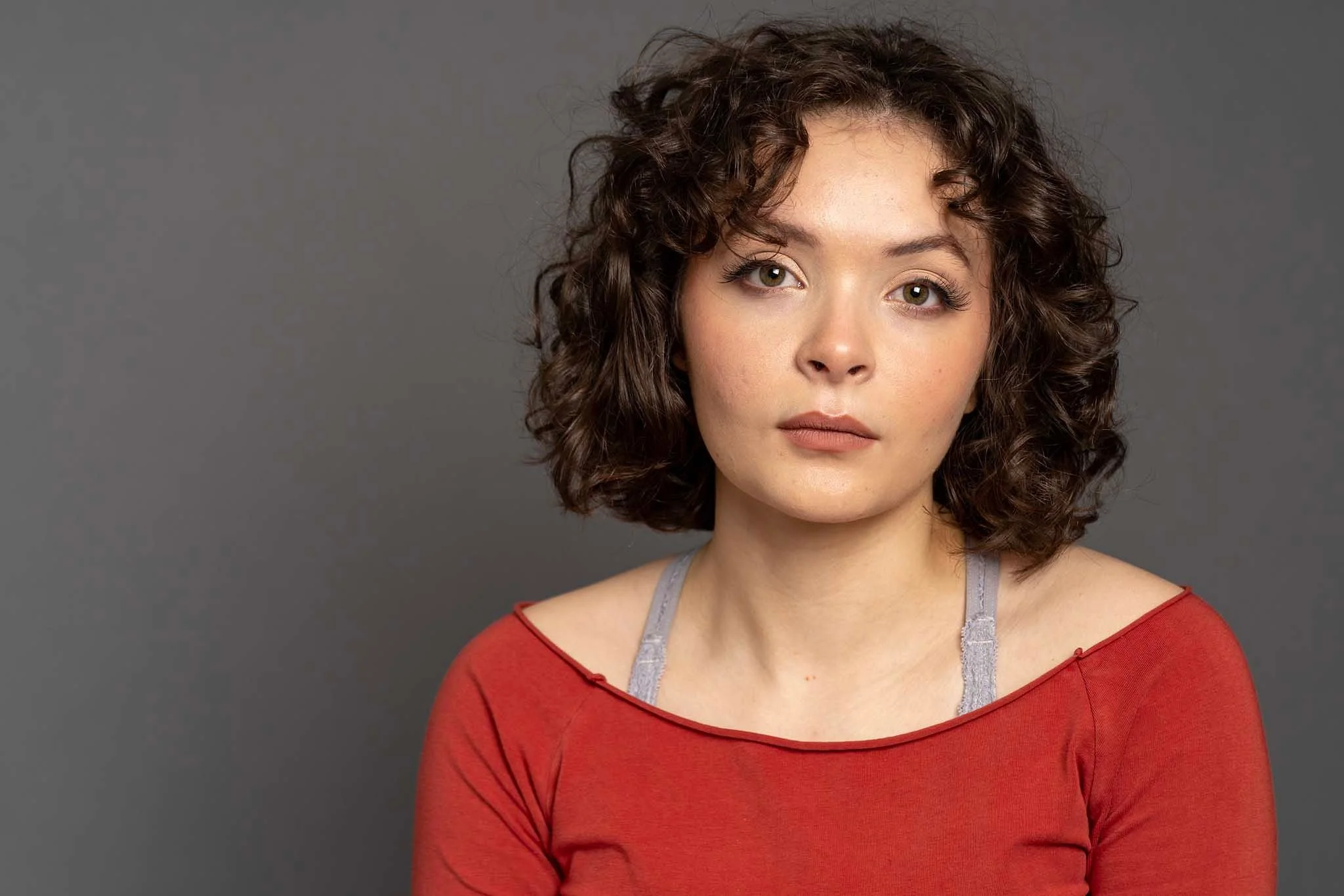 Headshot Orange Top 03.jpg