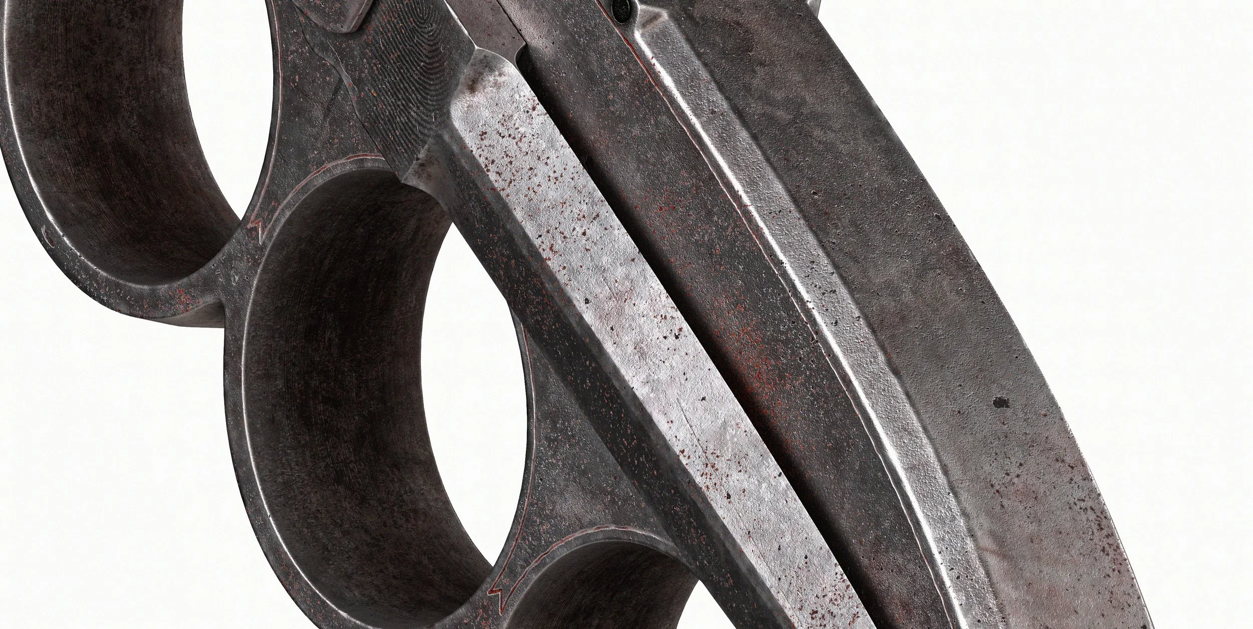 Close-up of forged steel gears with a rough surface and circular cutouts.