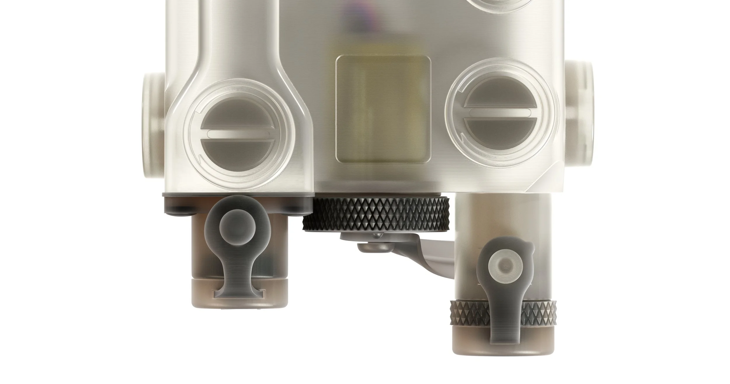 Close-up of a medical device component with two circular dials, a digital display, and adjustable knobs.