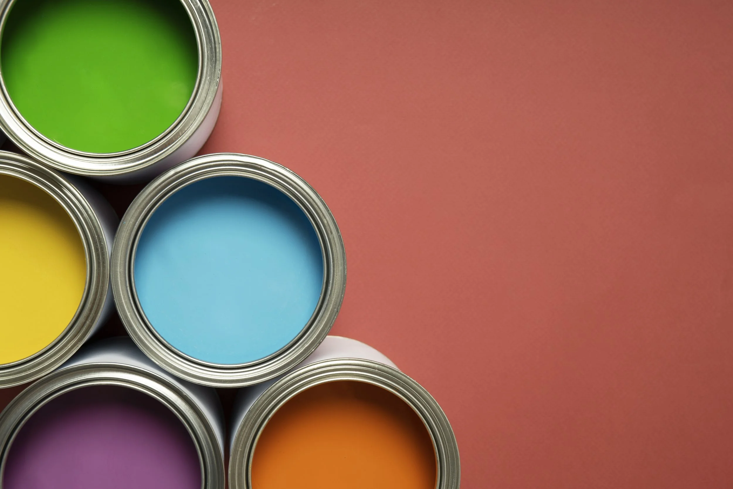 top-view-colorful-paint-cans-arrangement.jpg