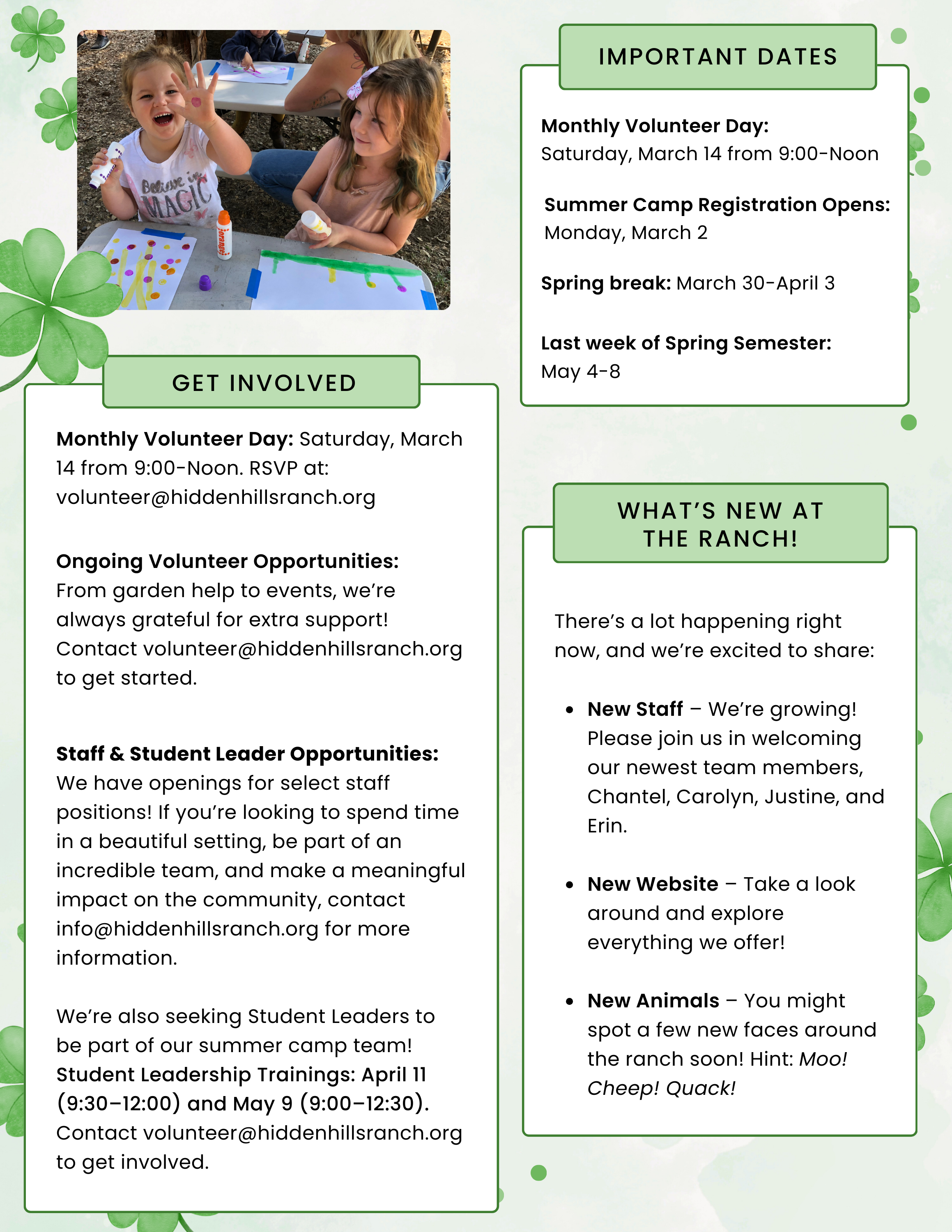Children engaging in arts and crafts outdoors, two girls smiling and raising their hands, with art supplies like glue sticks and paper on the table.