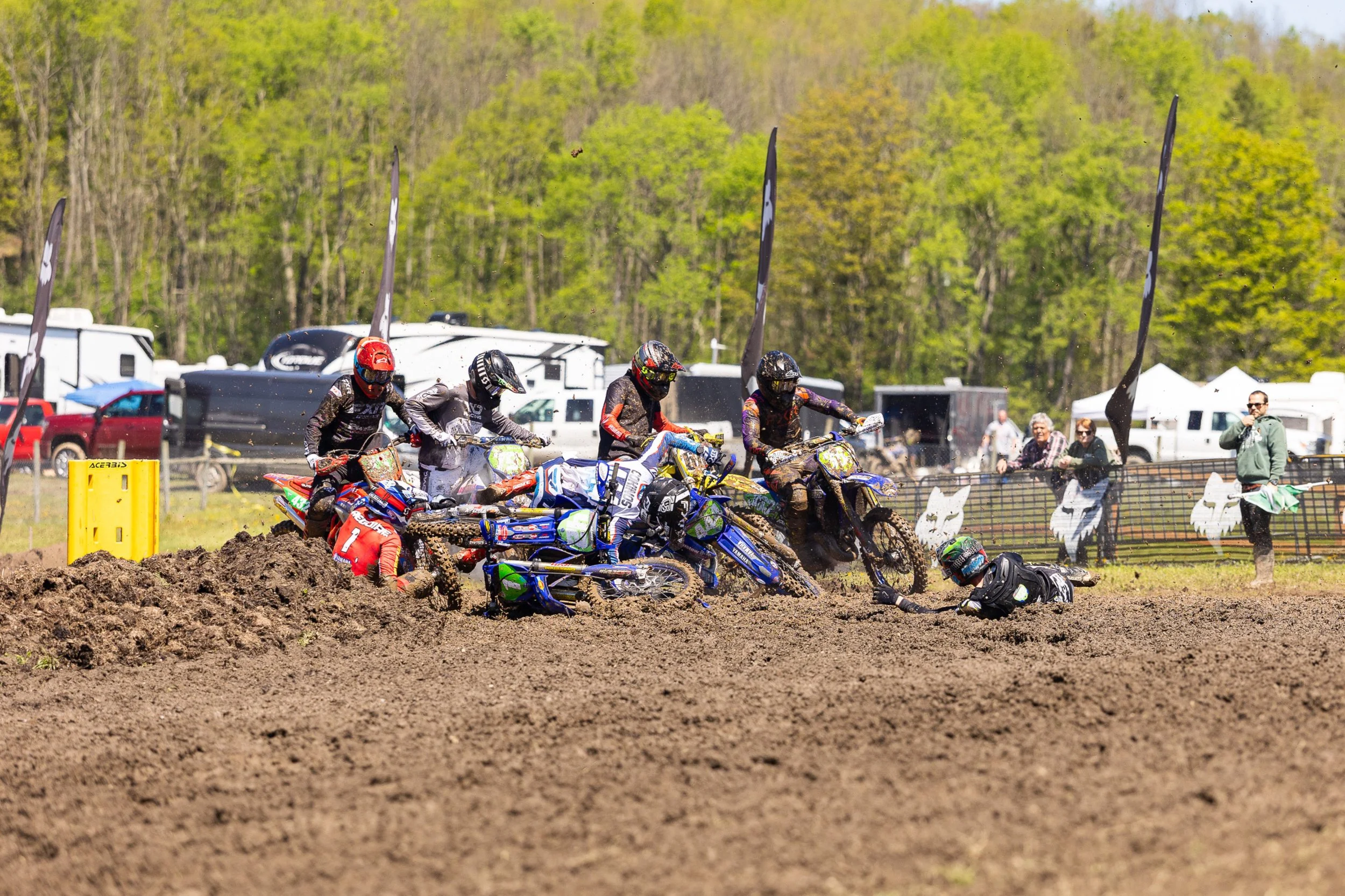 First turn pileup in the Pro 125 class moto 1.jpeg