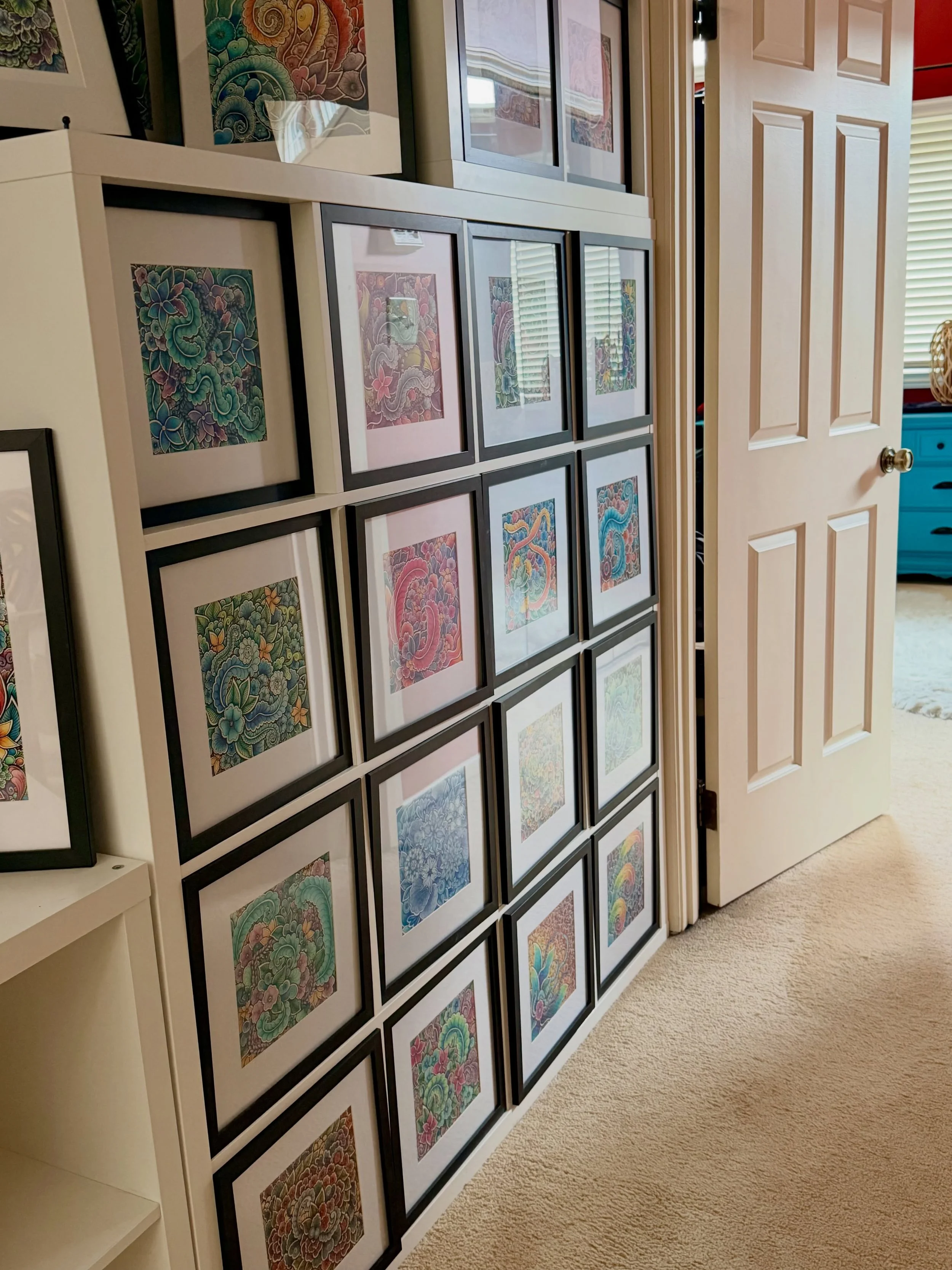 There is simply no vantage point from which to get a good shot, so you&rsquo;ll have to trust me when I say that I&rsquo;m thrilled with how this project is coming together in our upstairs hallway. IKEA Kallax meets my doodles. I&rsquo;ve been workin