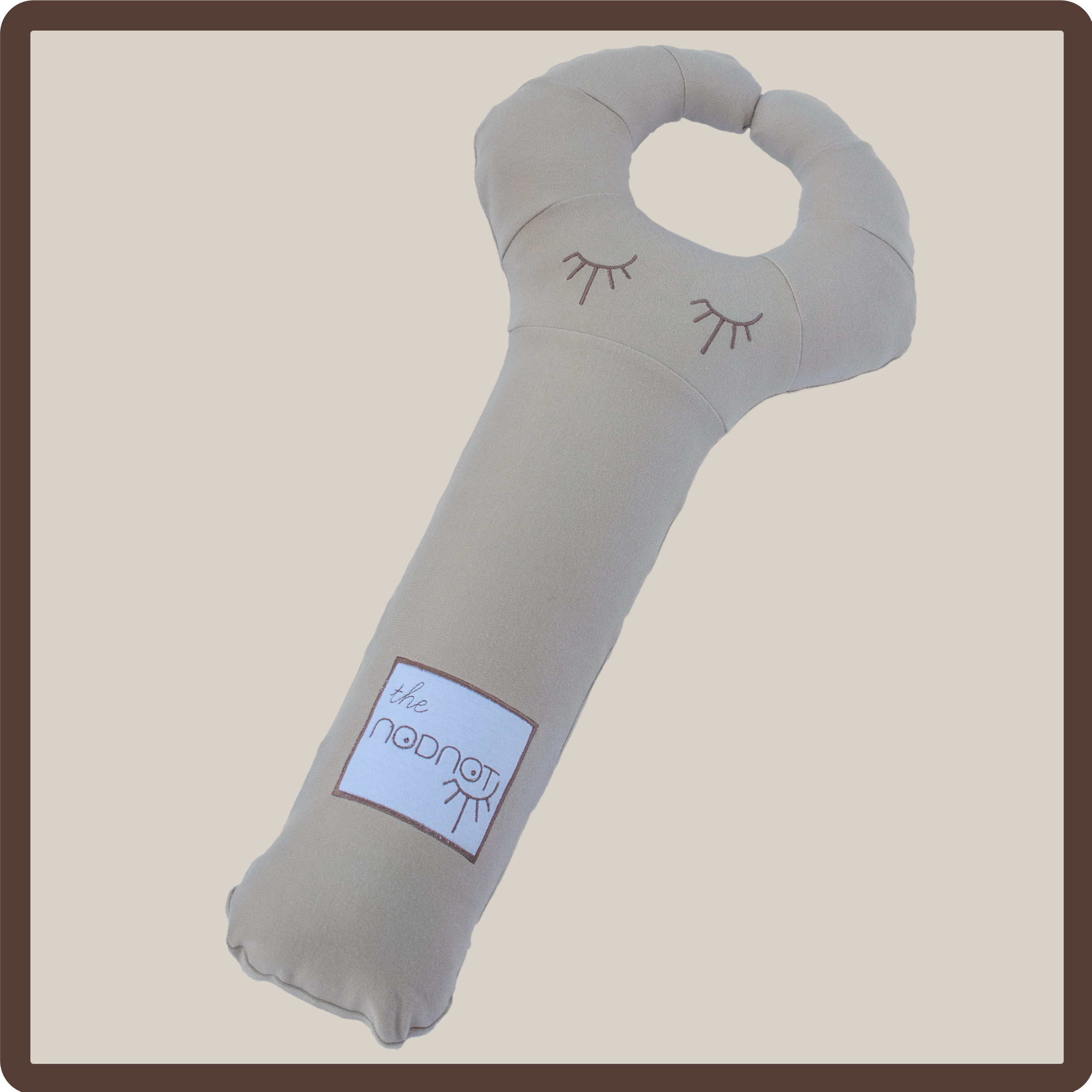 light brown nodnot travel pillow.png