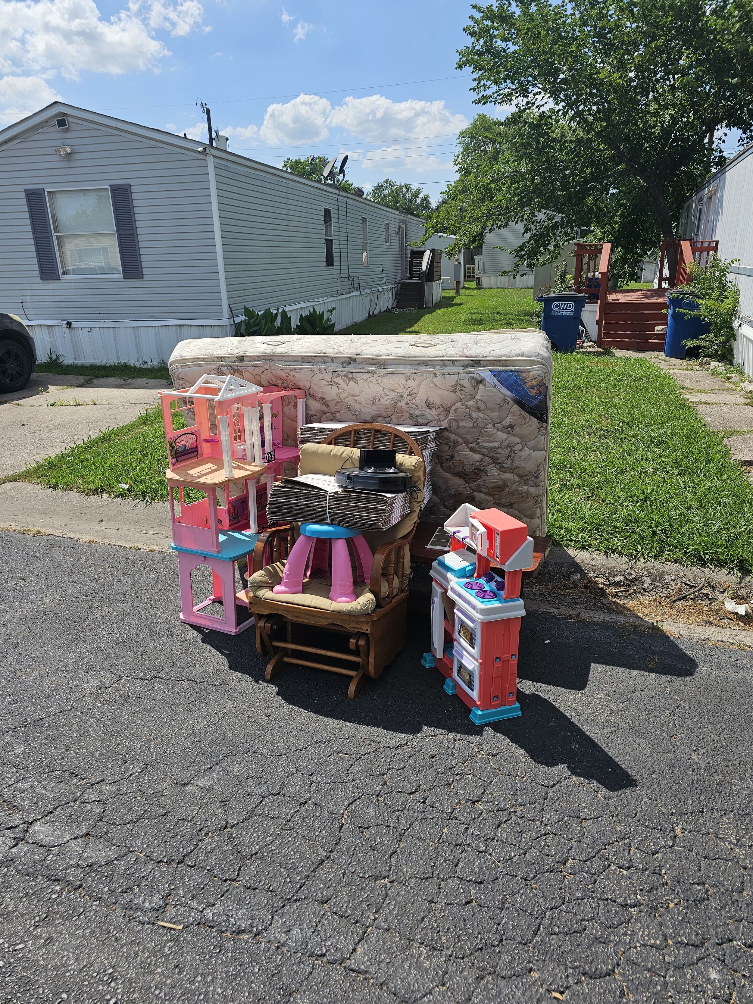 junk removal on the curb waiting to be picked up