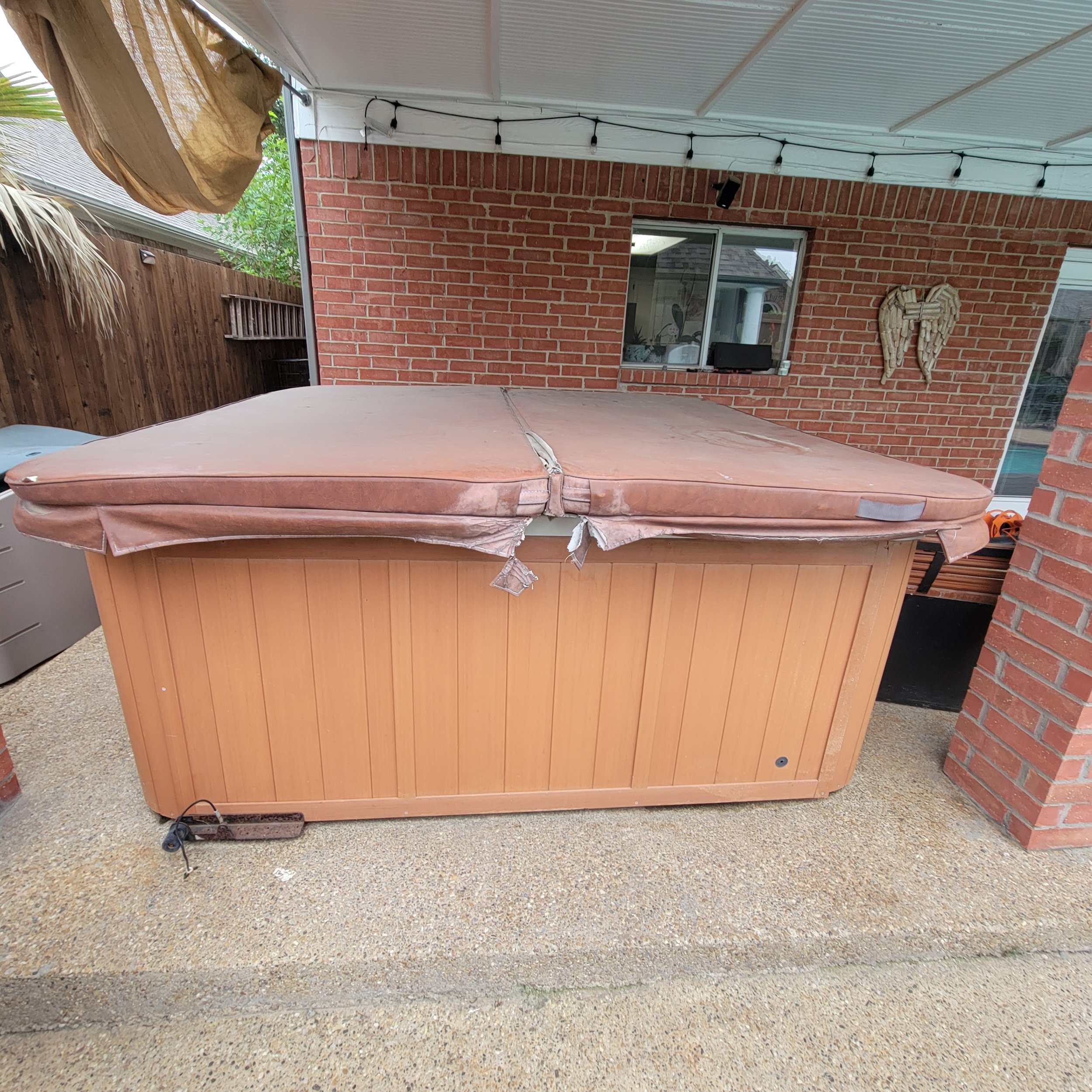 Yellow Rose Junk Removal removing a hot tub