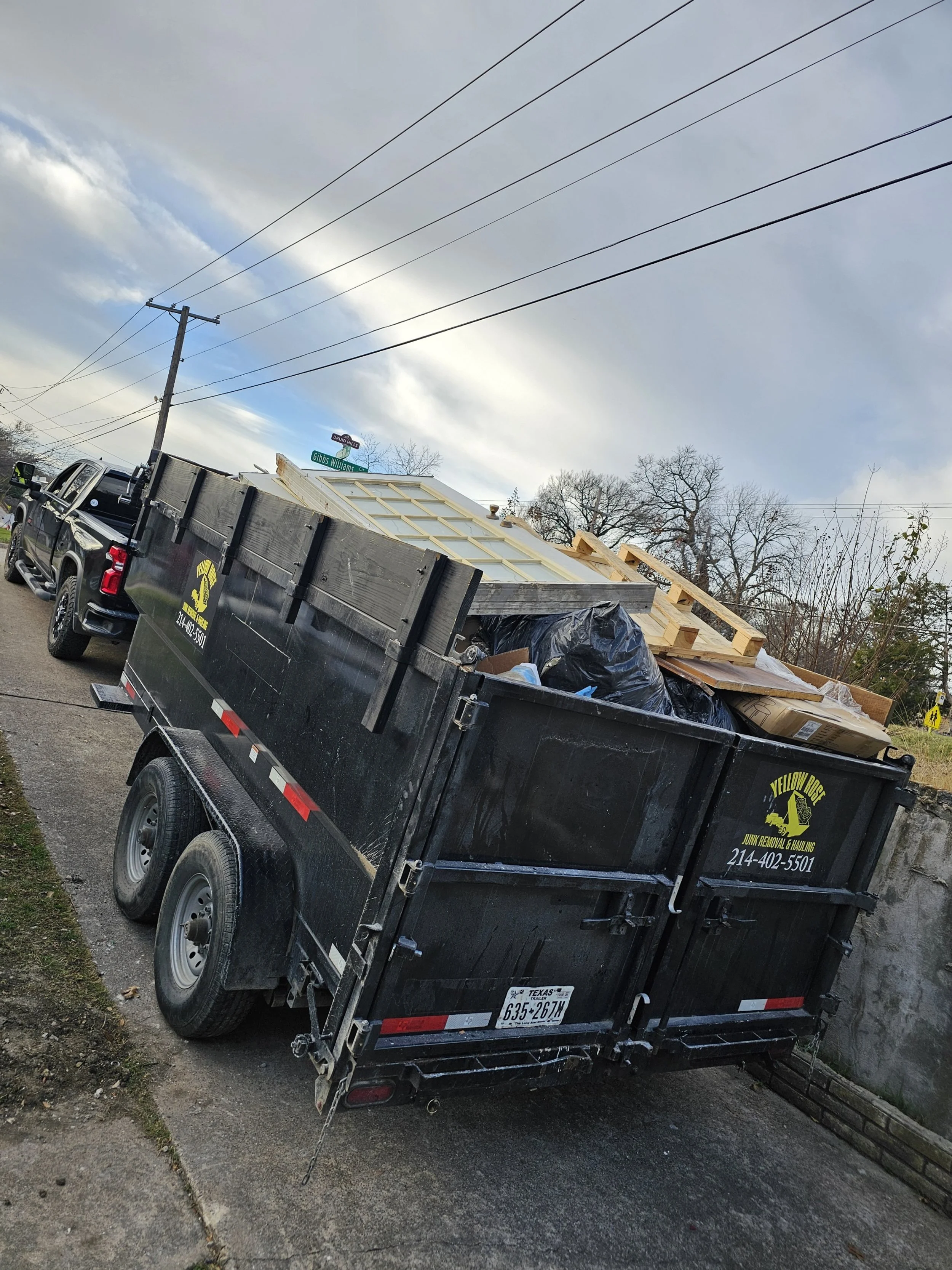 Junk removal trailer loaded with remodeling debris in Dallas