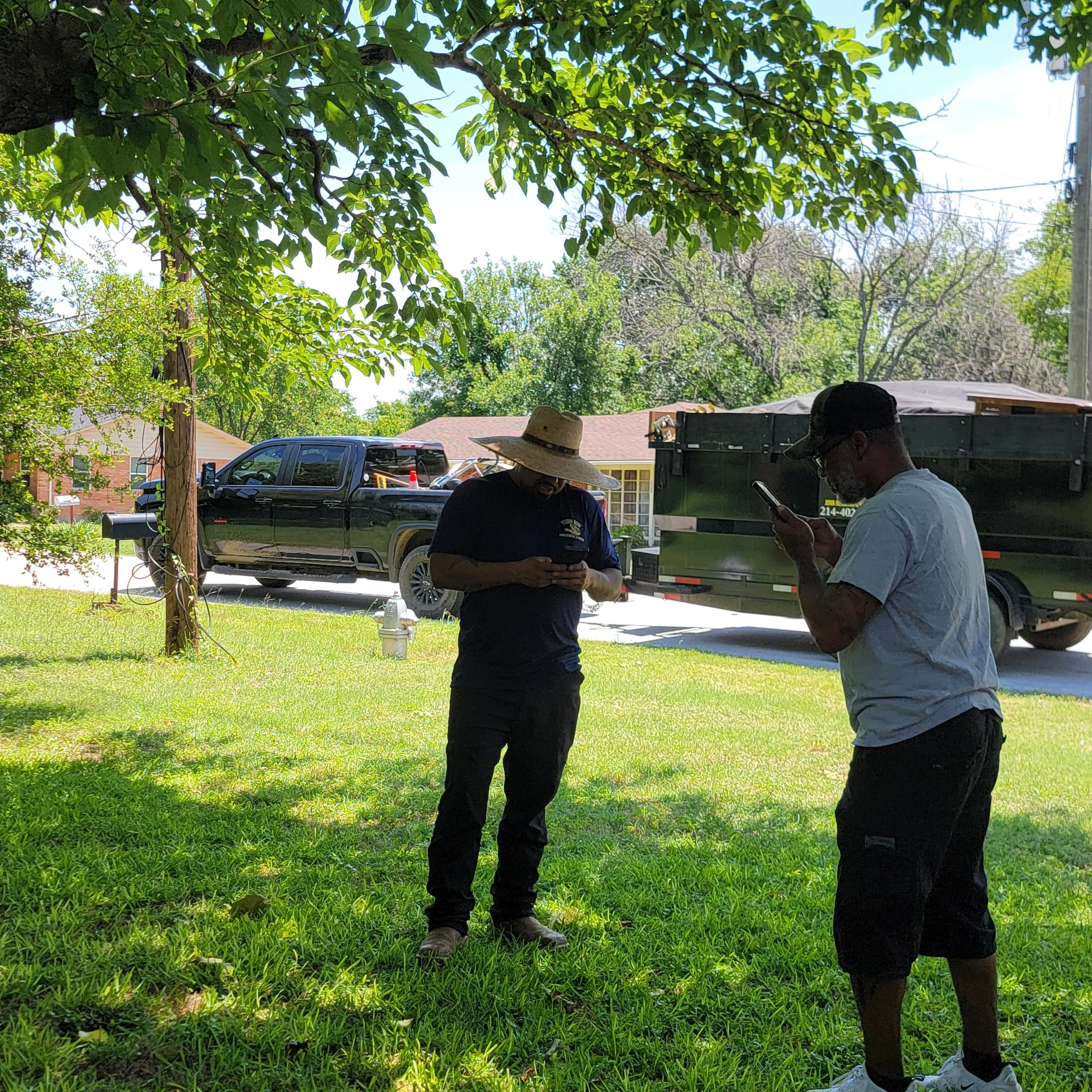 Yellow Rose Junk Employee talking to a customer