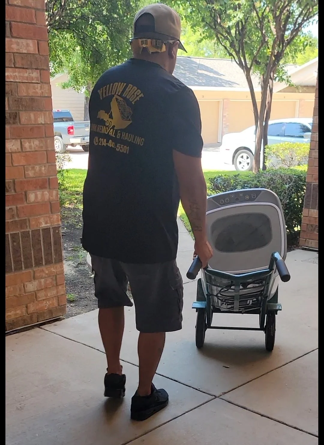Hauling away an old washer in Dallas Texas