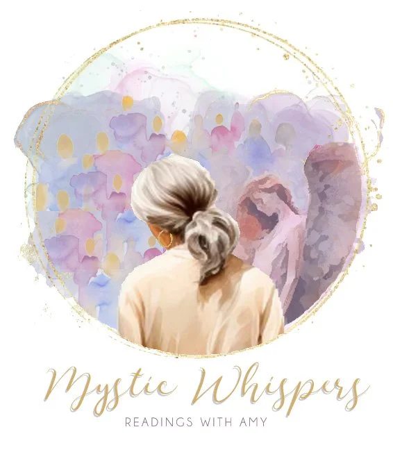 Illustration of a woman with gray hair in a loose bun, facing away, with a pastel-colored abstract background of people and a heart shape, with the text 'Mystic Whispers' and 'Readings with Amy'.