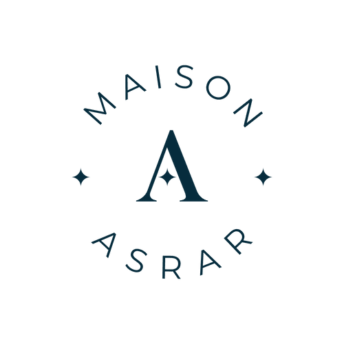 Logo with a large 'A' in the center, surrounded by the words 'Maison Asrar', two small stars on either side of the 'A', all in dark blue.