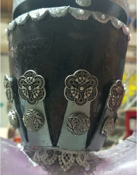 A close up of the wooden block, now completely rendered and now includes the metal embellishments and ornate designs.