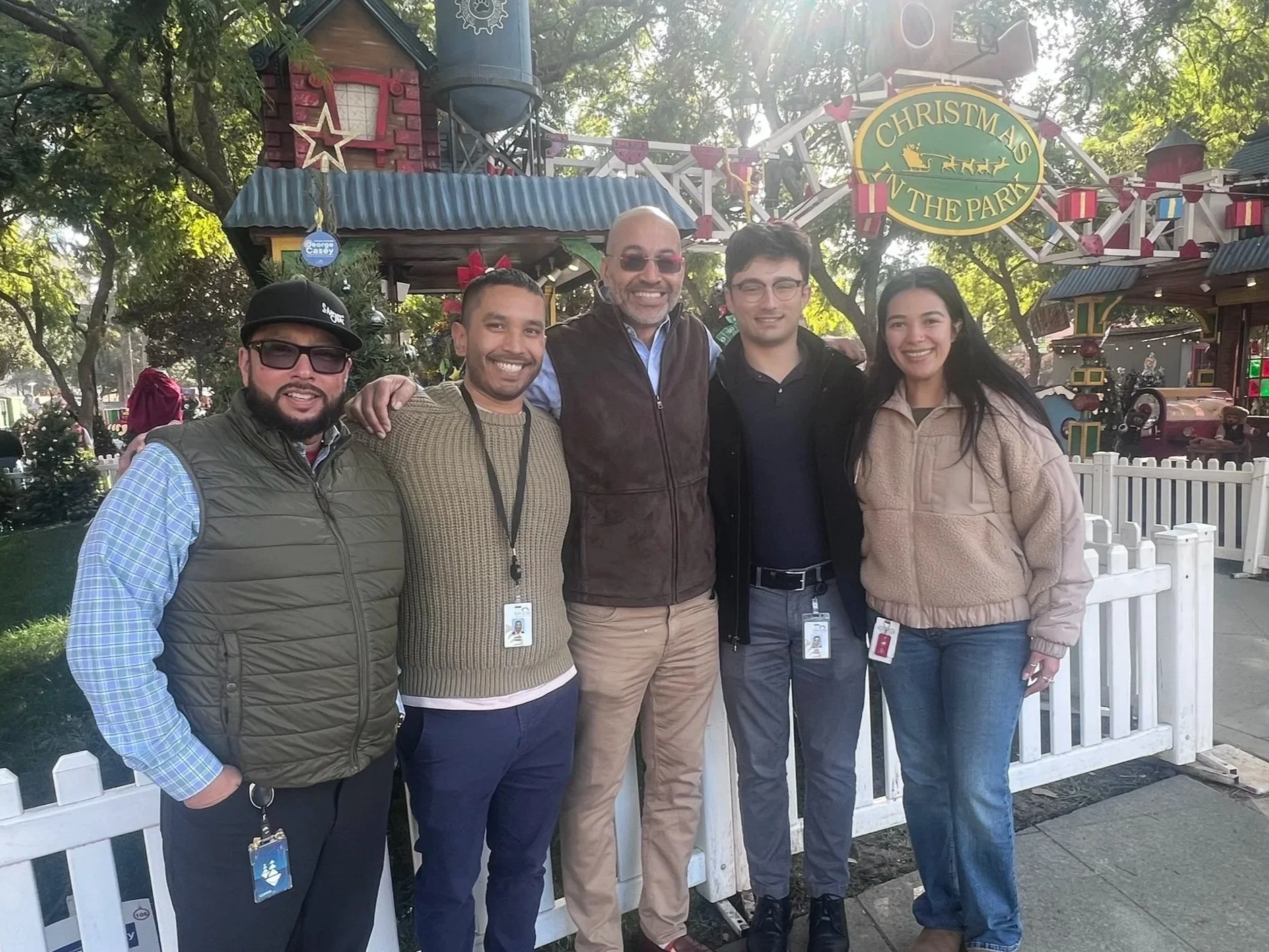 Councilmember Casey with his team in front of Christmas in the Park in December 2025.