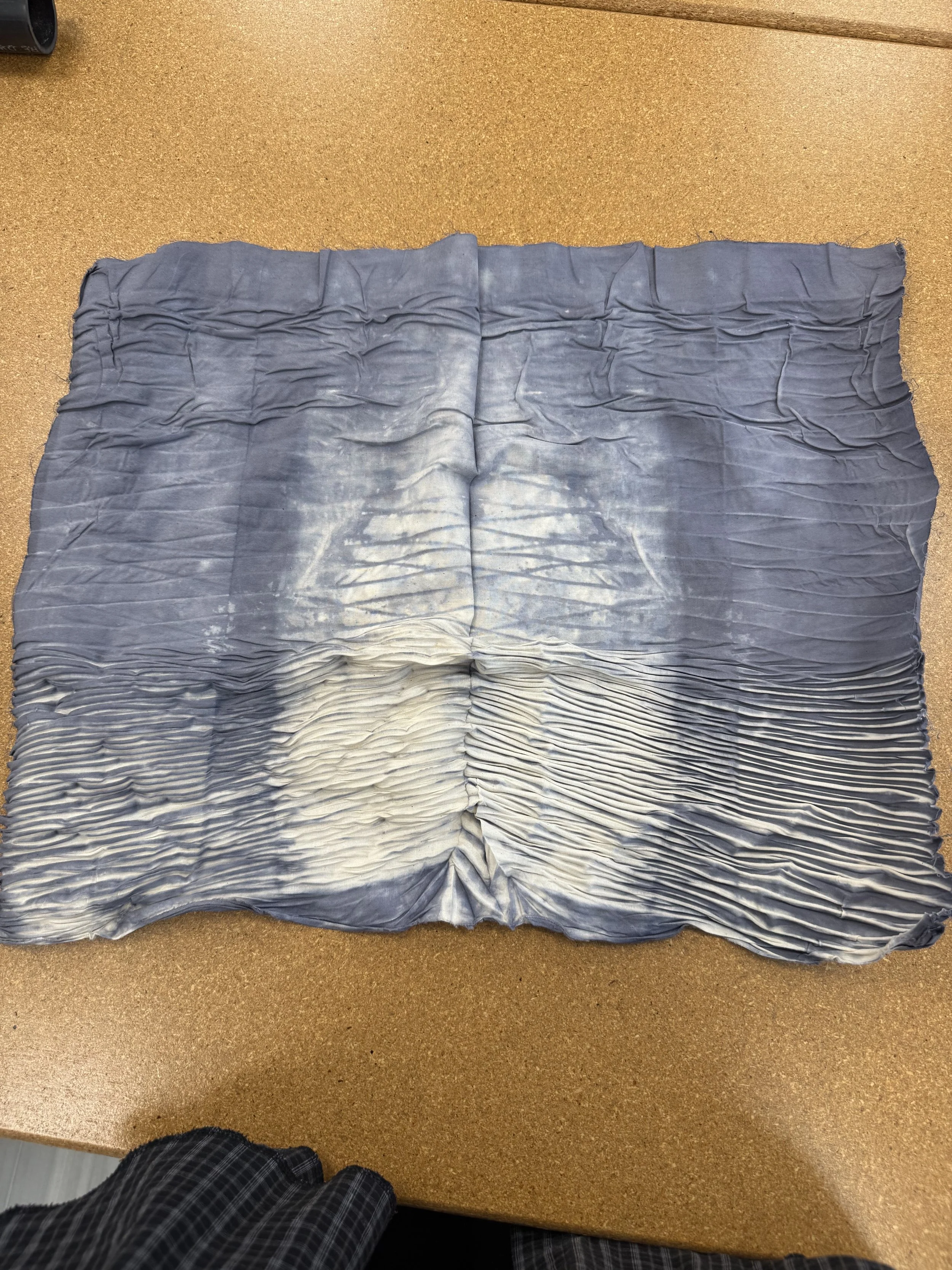 I then dipped my pole into a dye bath and heat set it to keep the color. This is the finished piece unraveled.