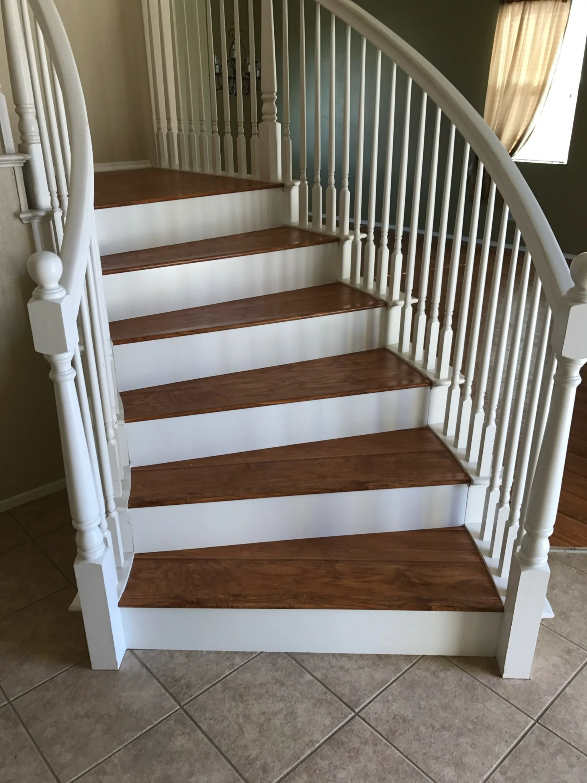 victorville-tile-gloss-laminate-stairs-white-risers.JPG